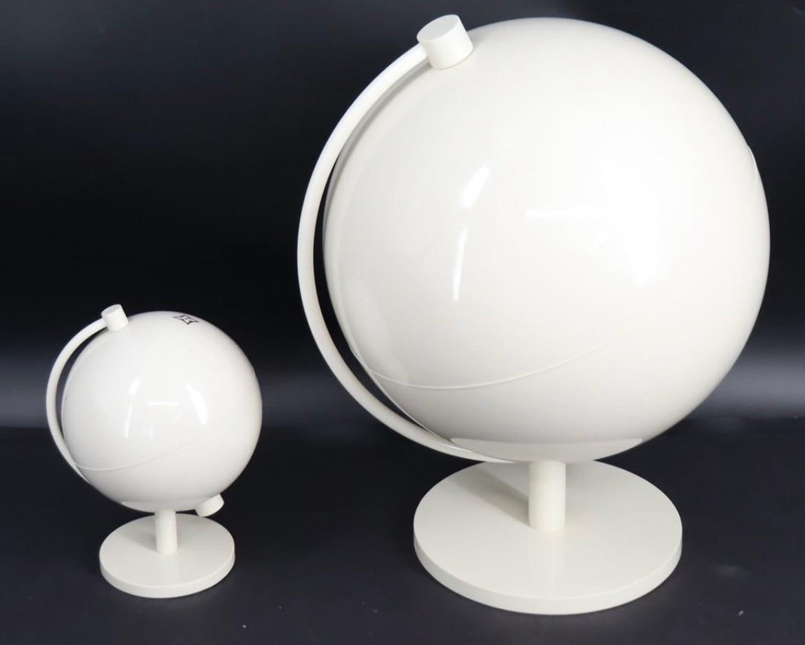 Pair of Louis Vuitton Display White Spinning World Globes Sculpture In Good Condition For Sale In West Hartford, CT