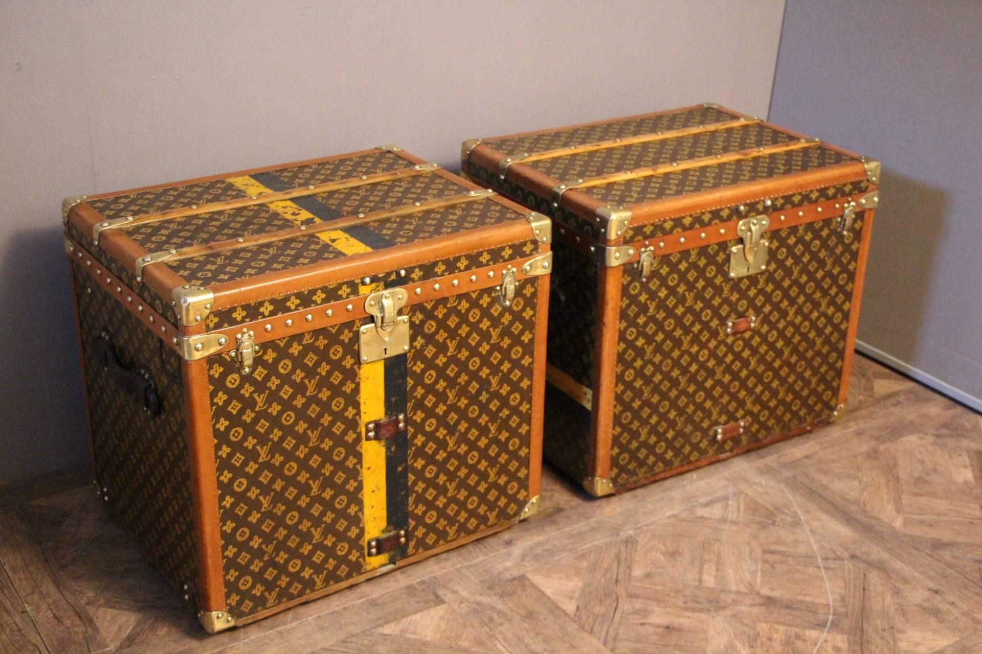 Very rare matching pair of Louis Vuitton trunks in the very sought after shape.
All stencilled monograms.
Lozine trim, stamped Louis Vuitton locks and studs and leather handles.
One has got vertical stripes as the other one has got the same