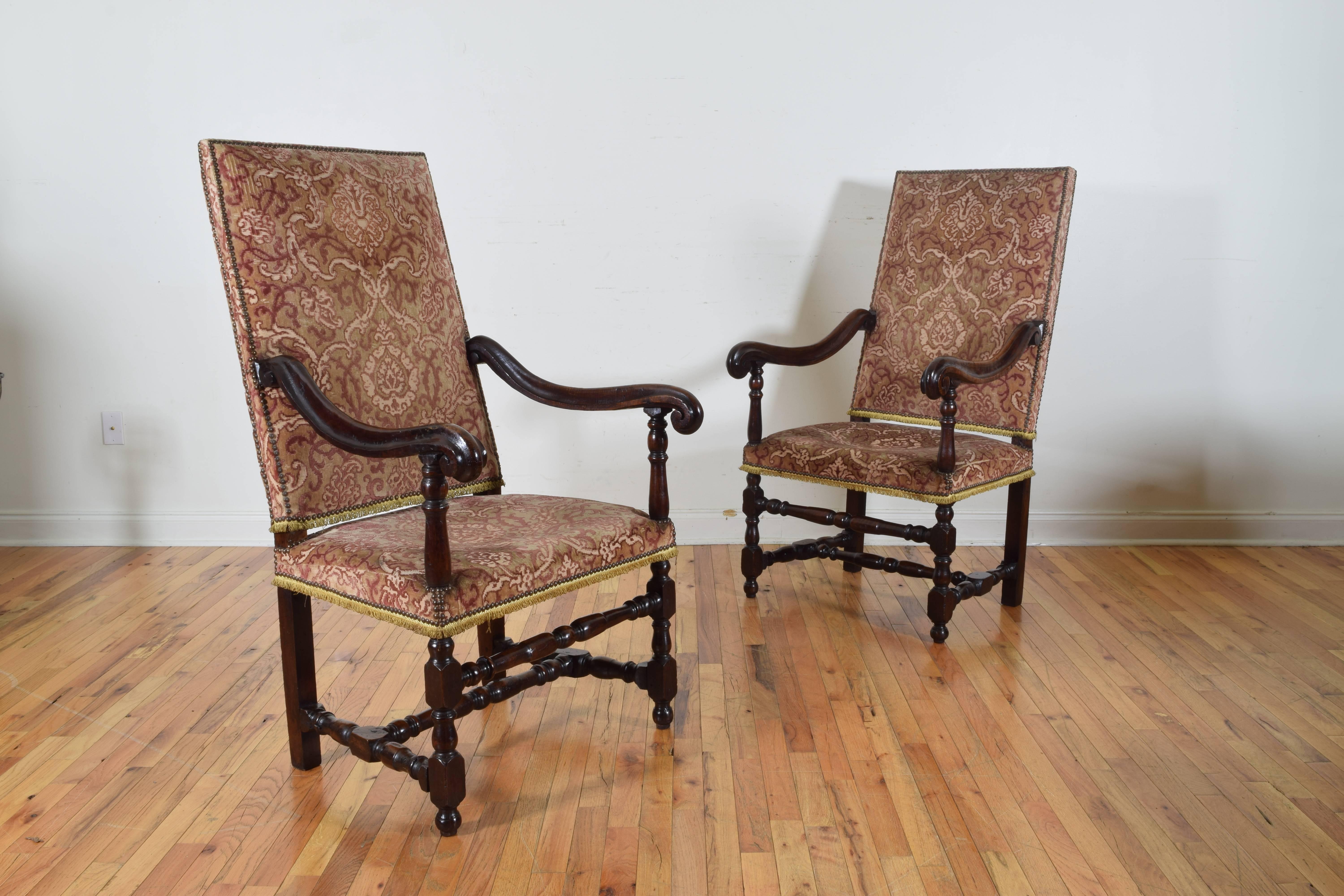 Pair of Louis XIII period armchairs. Cut velvet upholstered.