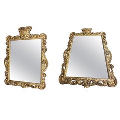 Pair of Louis XIV Carved Baroque Giltwood Mirrors