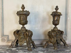 Pair of Louis XIV style andirons in bronze after a design by André-Charles Boull