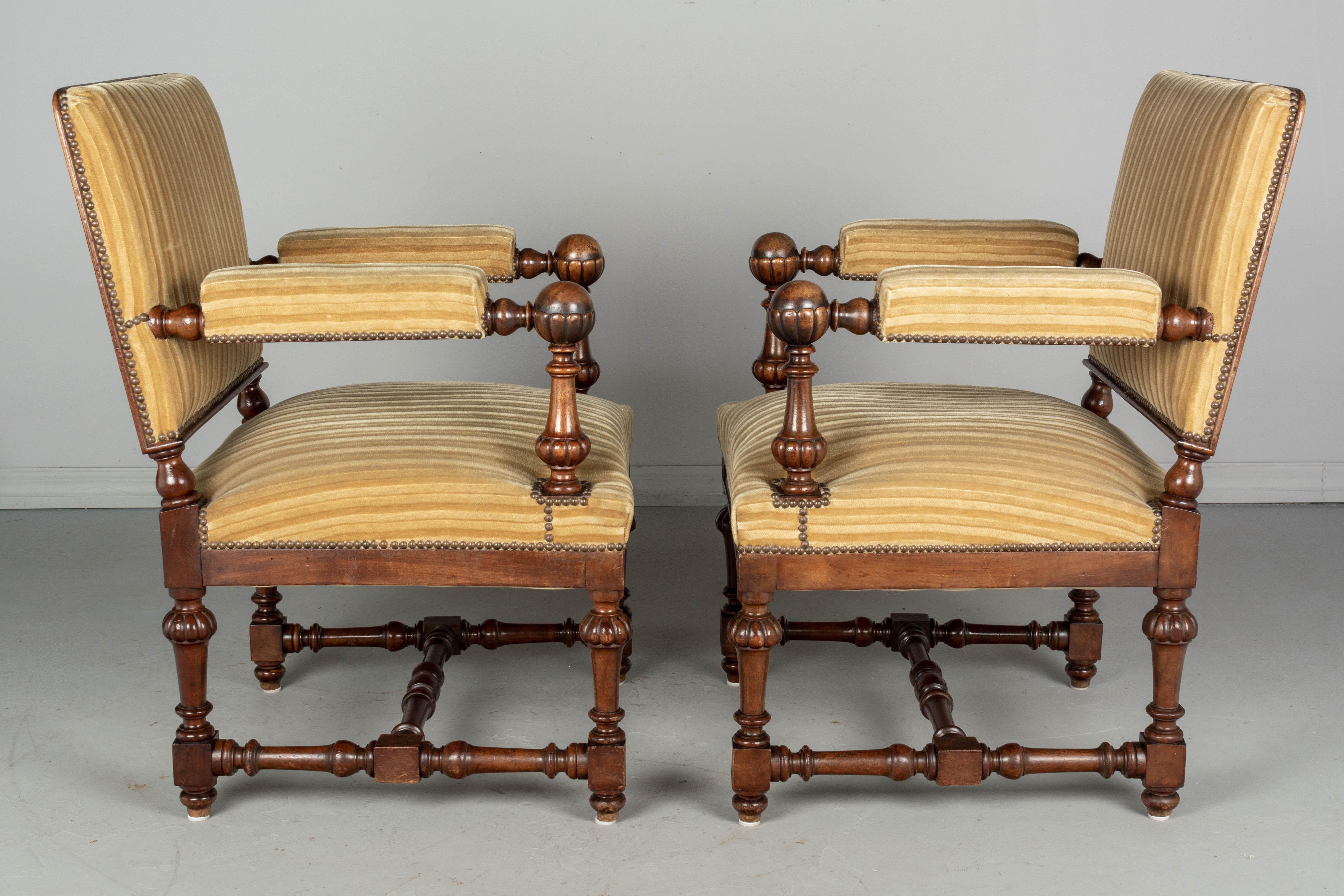 Hand-Crafted Pair of Louis XIV Style French Walnut Fauteuils For Sale