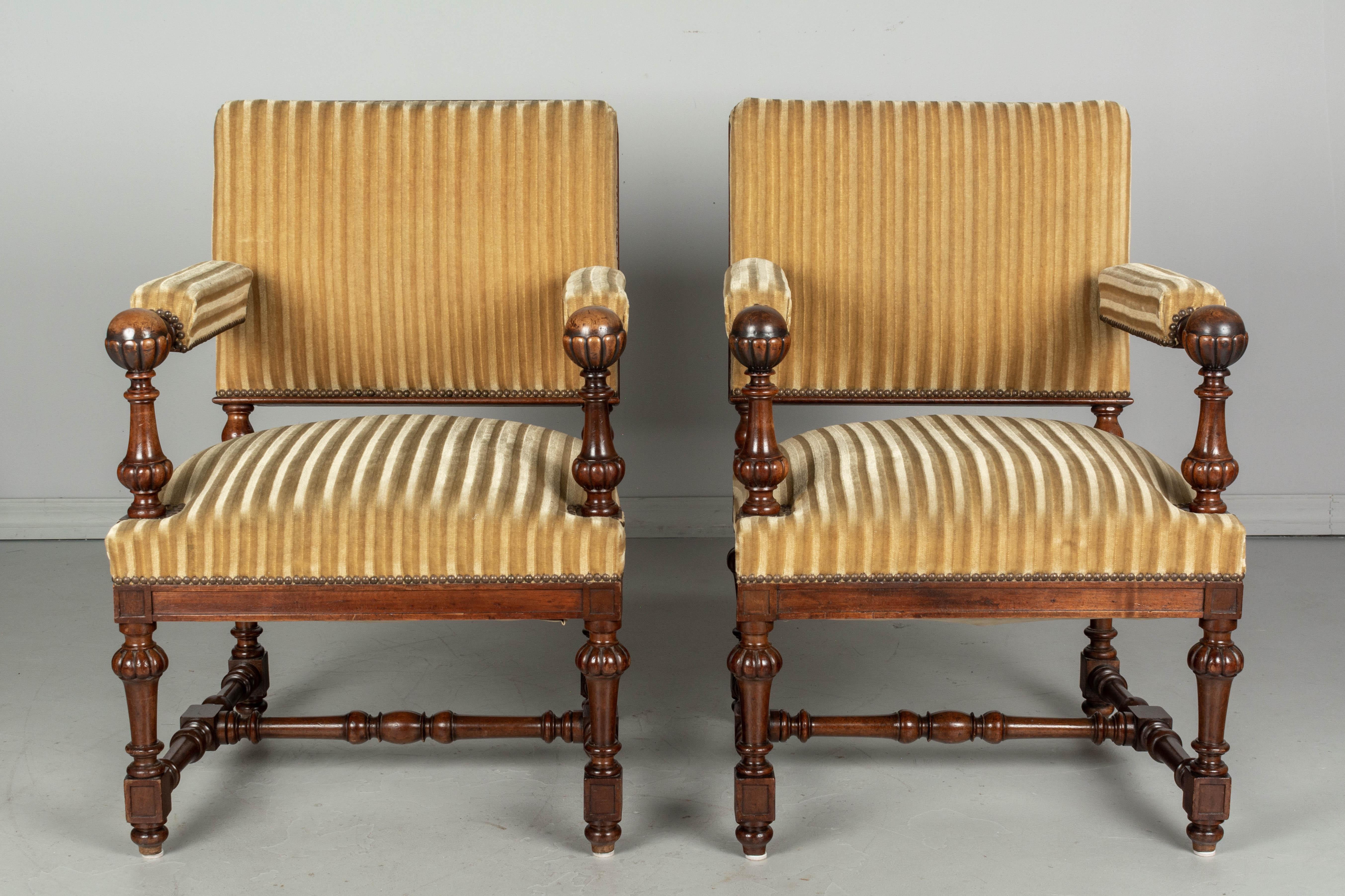20th Century Pair of Louis XIV Style French Walnut Fauteuils For Sale