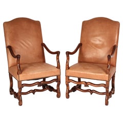 Pair of Louis XIV Style Leather Upholstered Walnut armchairs