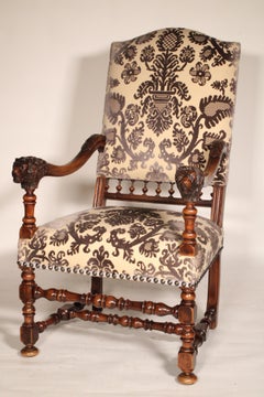 Pair of Louis XIV Style Walnut Armchairs with Lion Carved arms