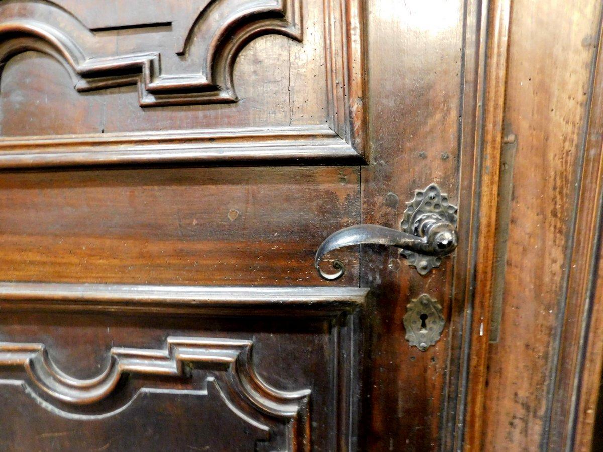 Hand-Carved Pair of Louis XIV Walnut Interior Doors with Frame, 18th Century, Italy For Sale