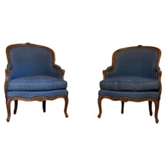 Antique Pair of Louis XV armchairs in moulded and carved beech, 18th century