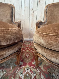 Pair of Louis XV bergères brown glazed velvet