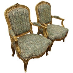 Pair of Louis XV Carved and Giltwood Armchairs