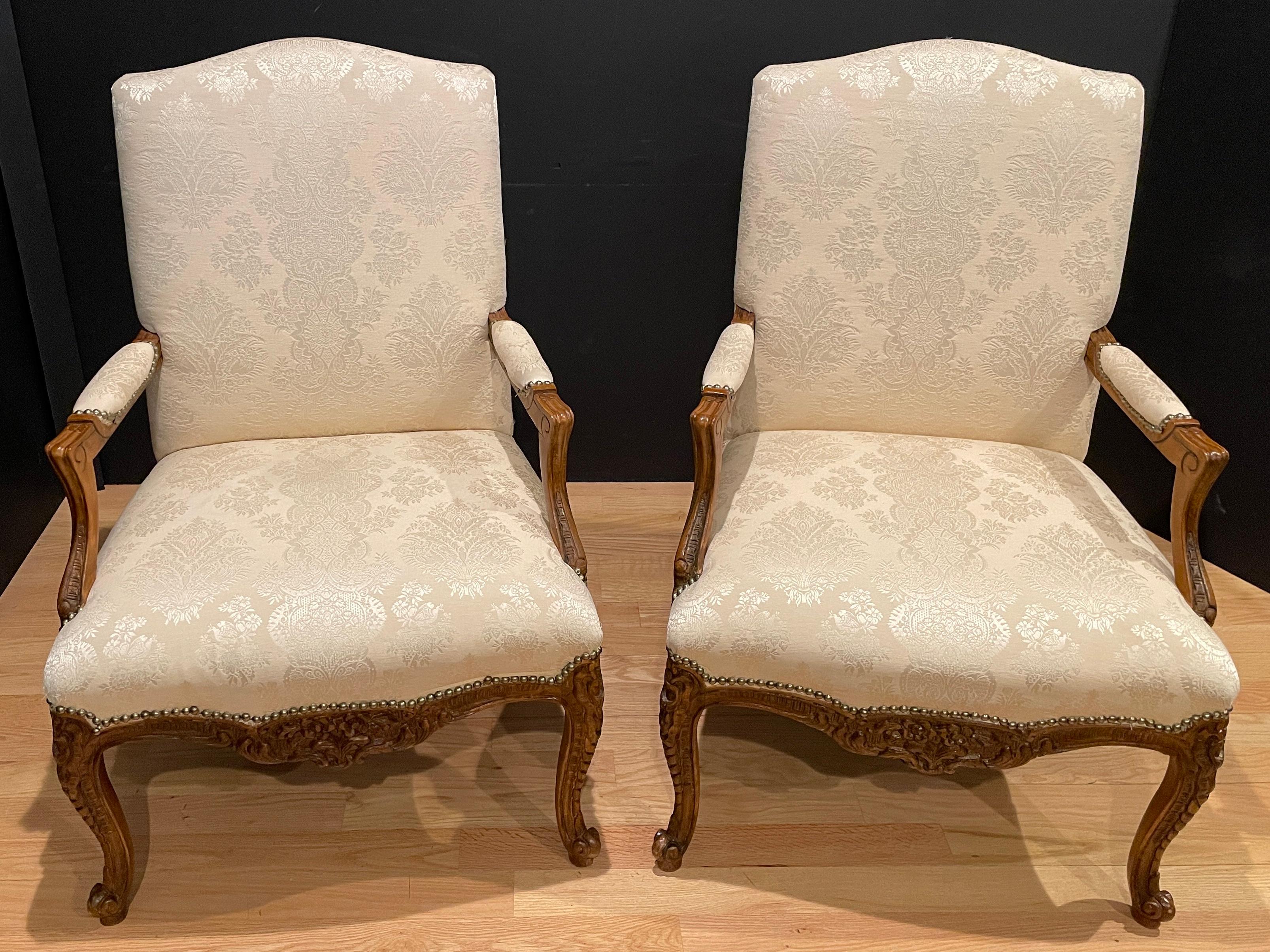 French Pair of Louis XV Carved Walnut Fauteuils