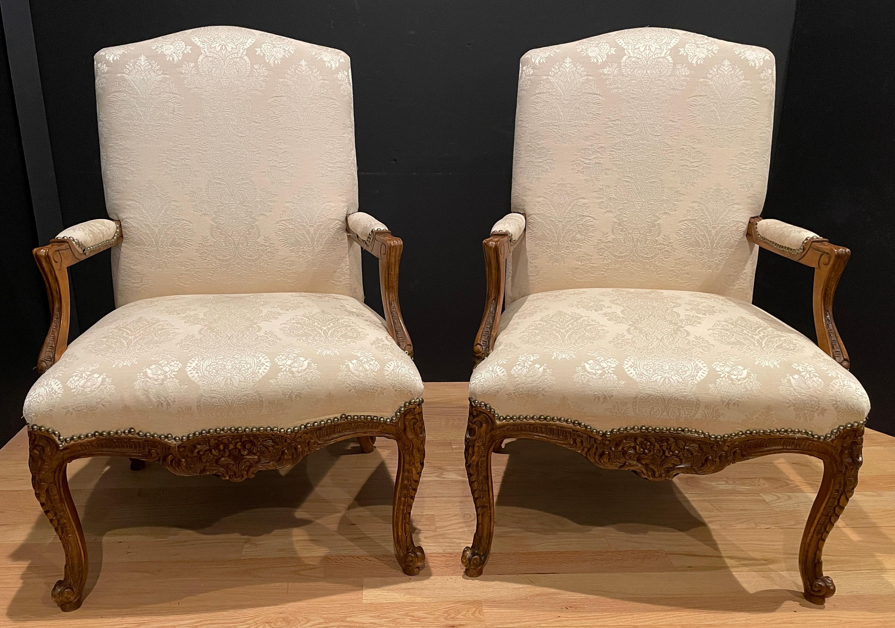 Hand-Carved Pair of Louis XV Carved Walnut Fauteuils