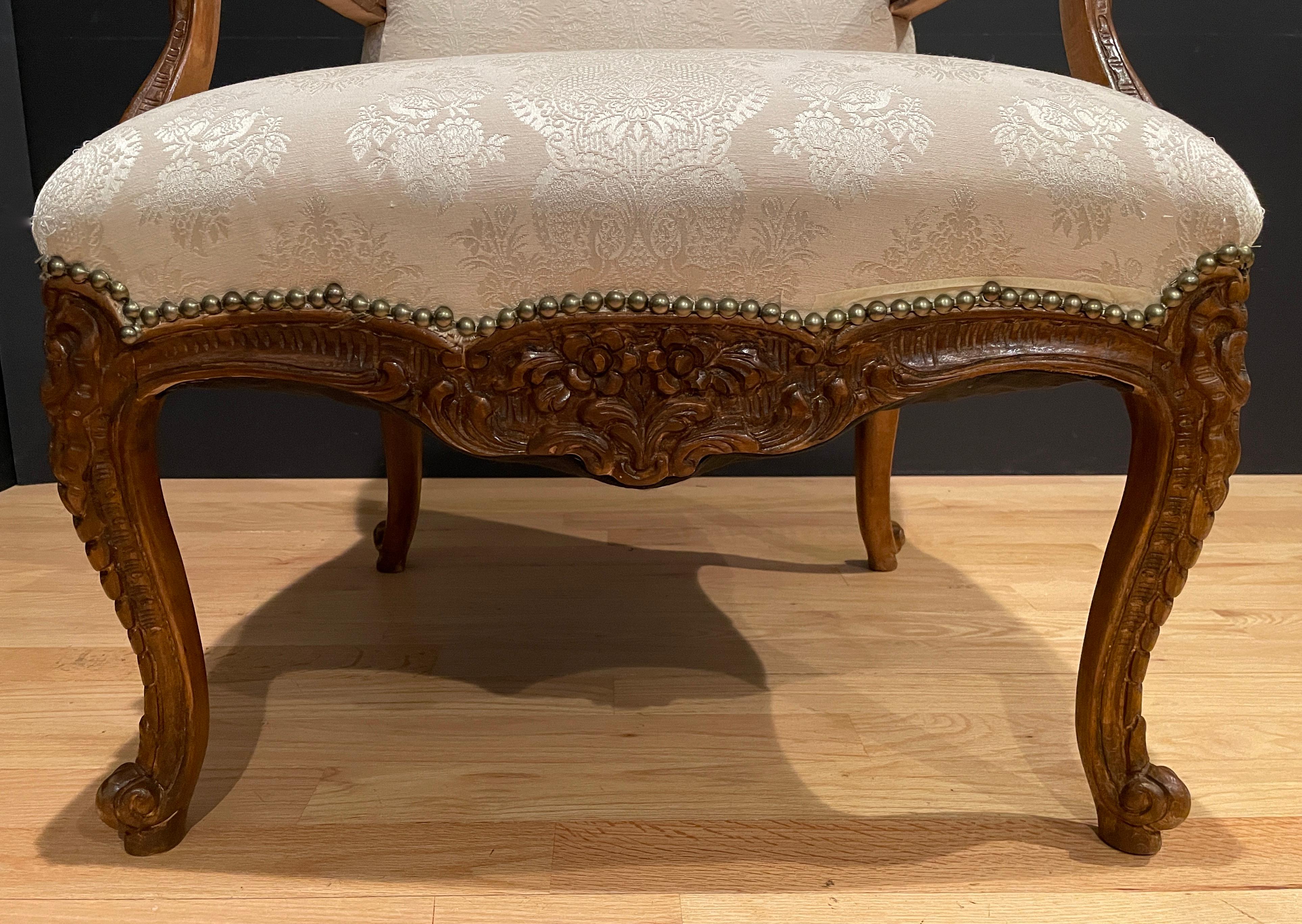 Pair of Louis XV Carved Walnut Fauteuils In Good Condition In Norwood, NJ