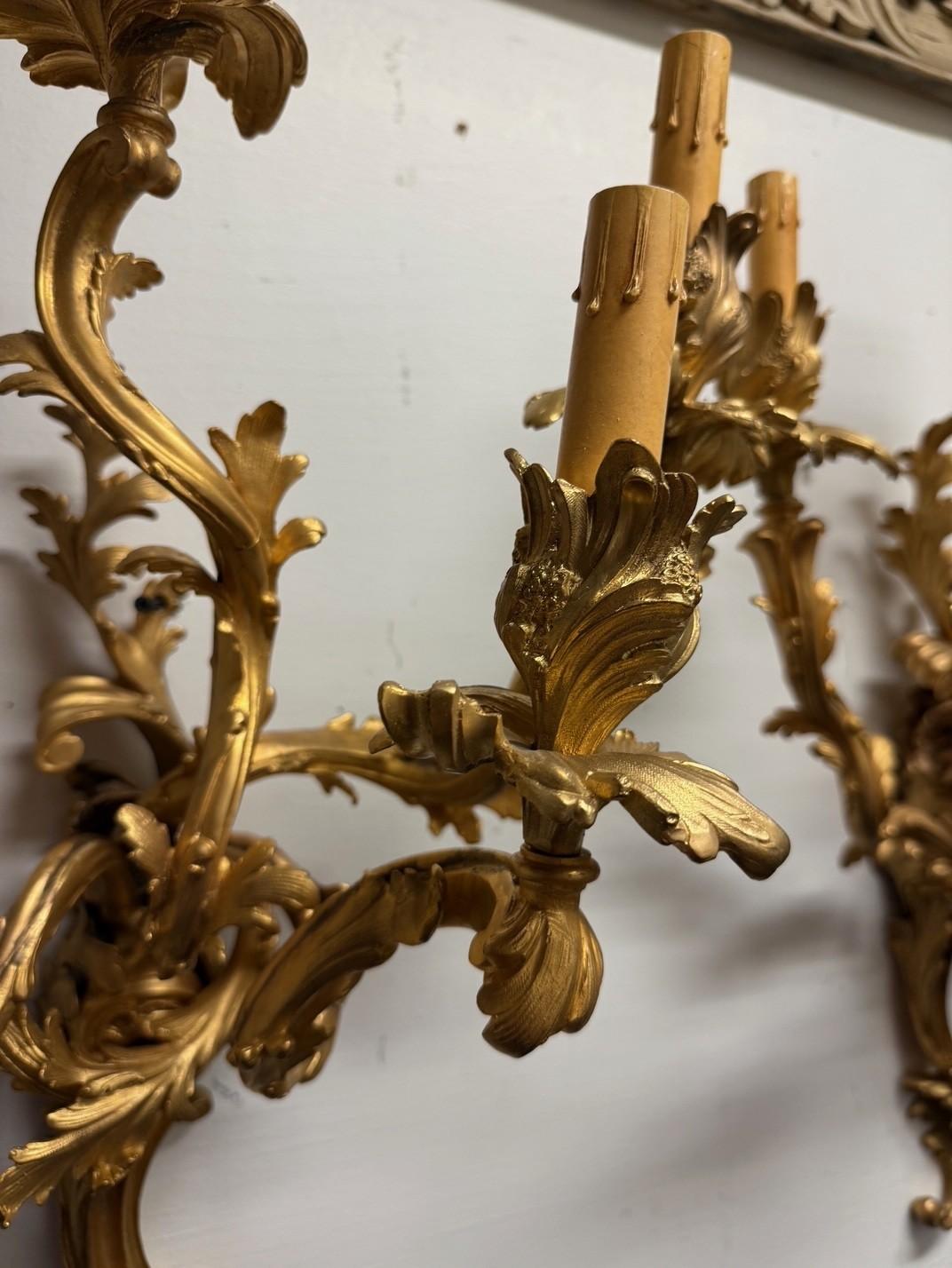 Pair of Louis XV French Rococo Style Gilt Bronze Five-Light Wall Sconces For Sale 11