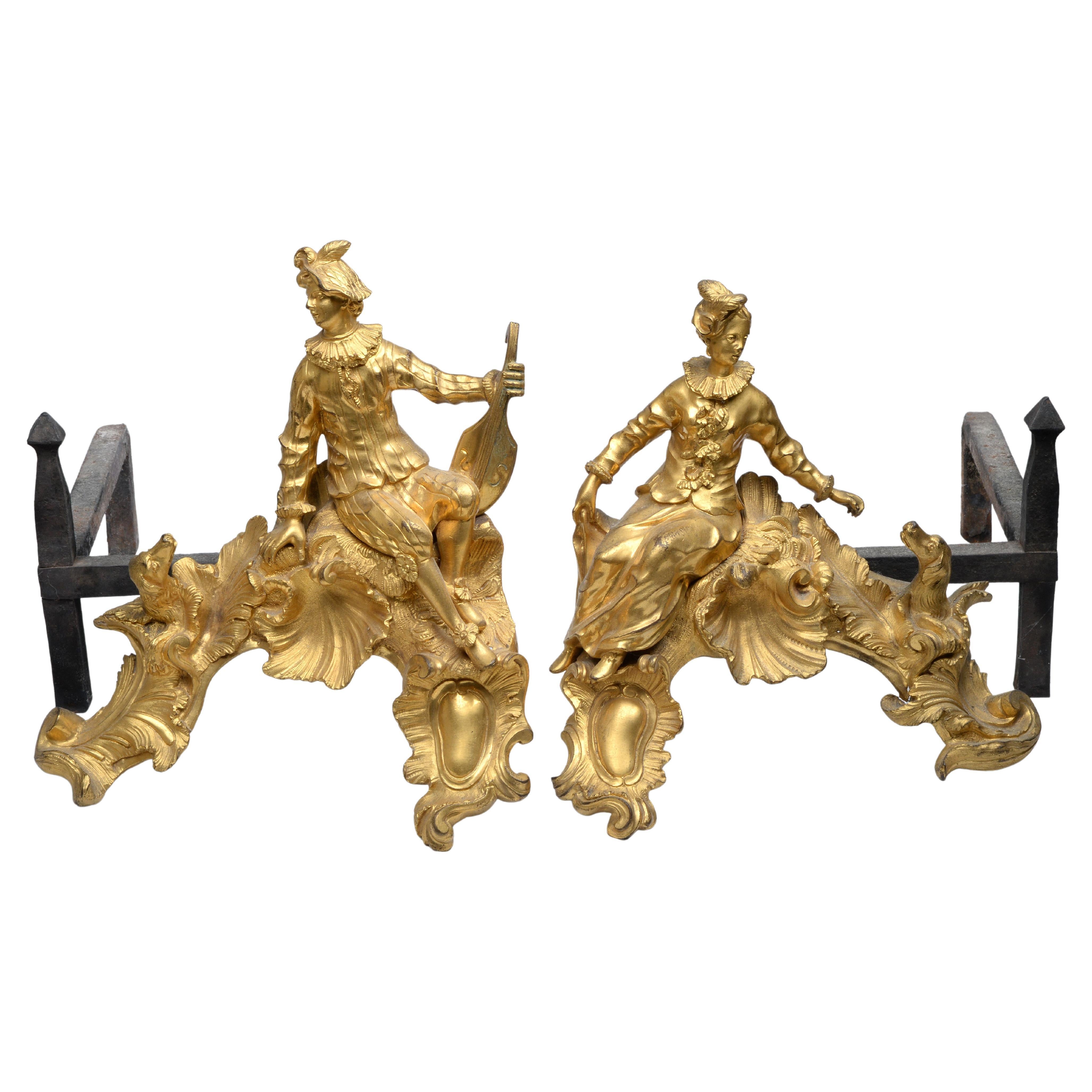 Paire de chenets figuratifs Louis XV en bronze doré en vente