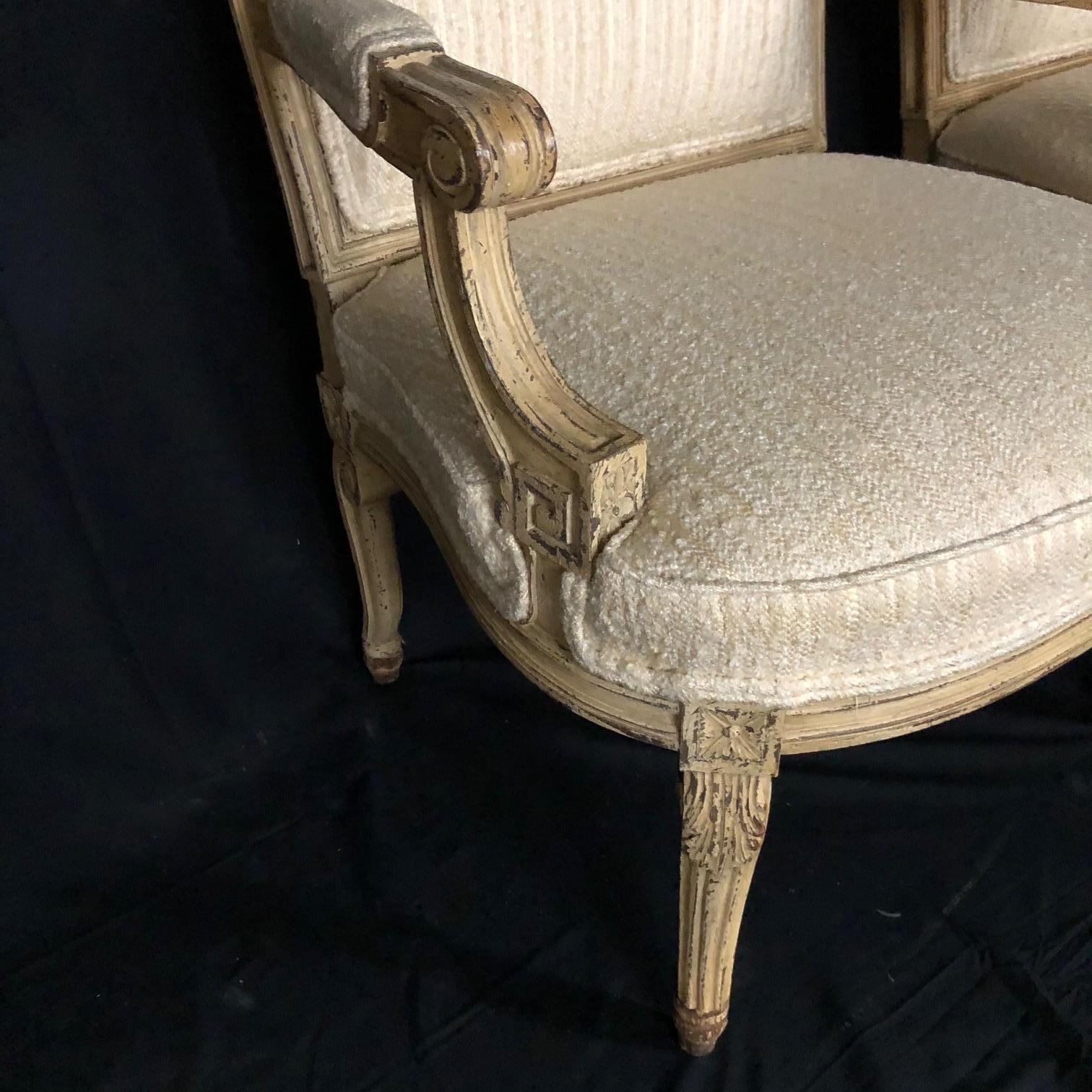 Pair of Louis XV Neoclassical Style Cream Painted French Bergere Arm Chairs For Sale 8