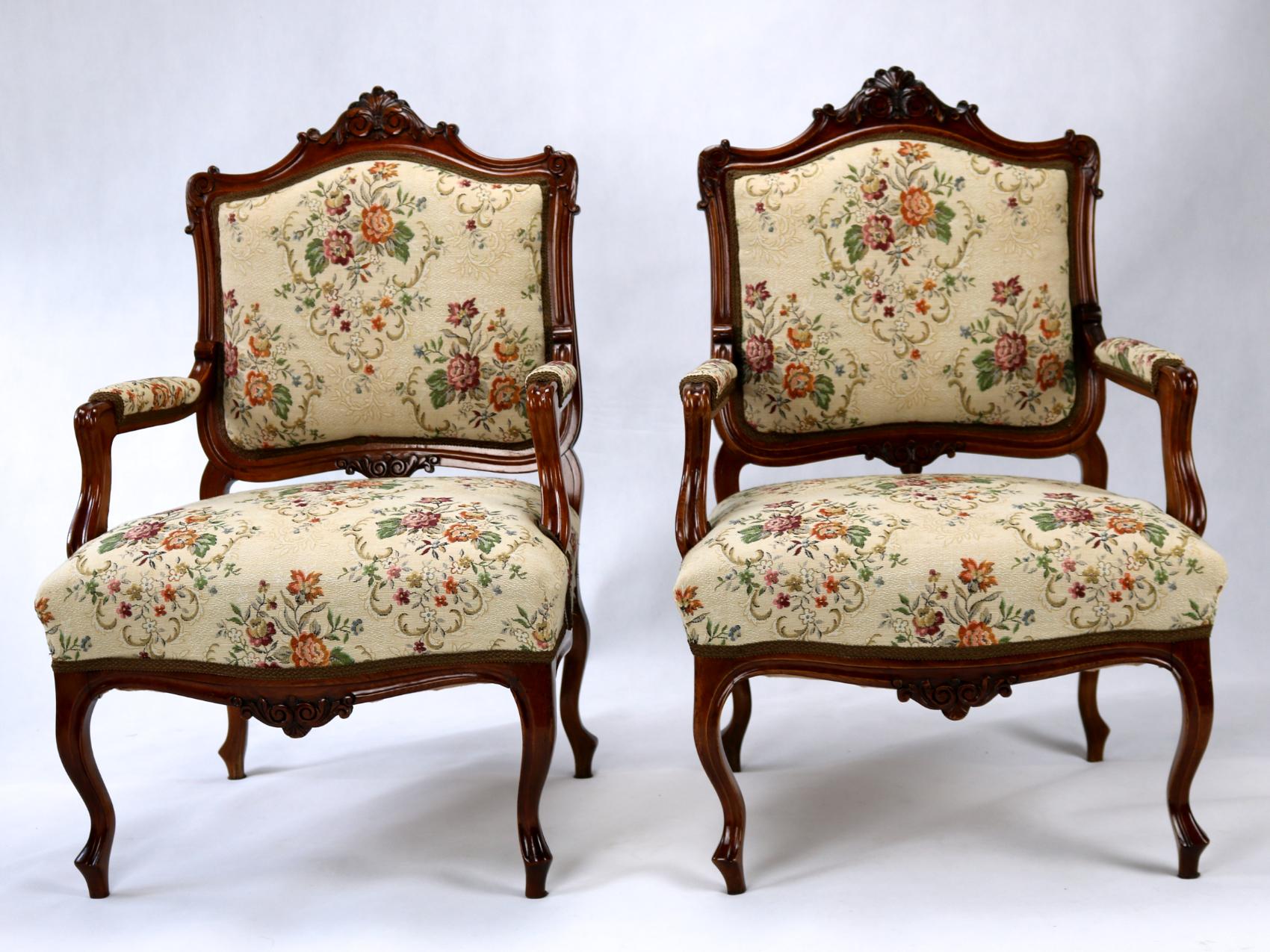 Pair of armchairs crafted during the second half of the 19th century during the Rococo Revival, a movement where the traditions of the Rococo Period and inspirations of Louis XV furniture heavily influenced furnishings and decorative arts. It shows