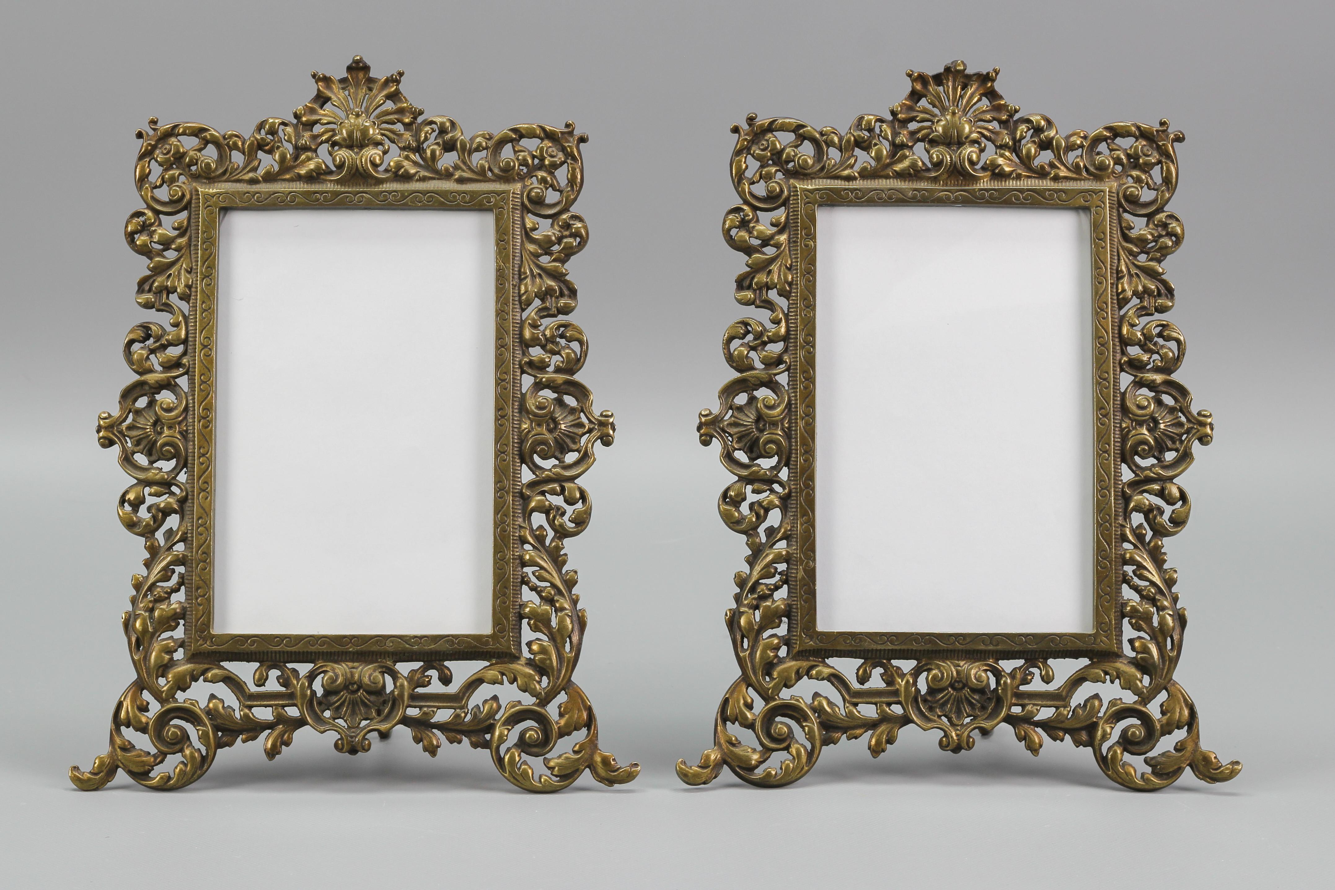 A beautiful pair of Louis XV or Rococo style French bronze picture frames. Ornate scroll, shell, and foliate motifs abound around the entire frameworks.
Dimensions: height: 32 cm / 12.6 in; width: 23 cm / 9.05 in; depth: 10 cm / 3.93 in.