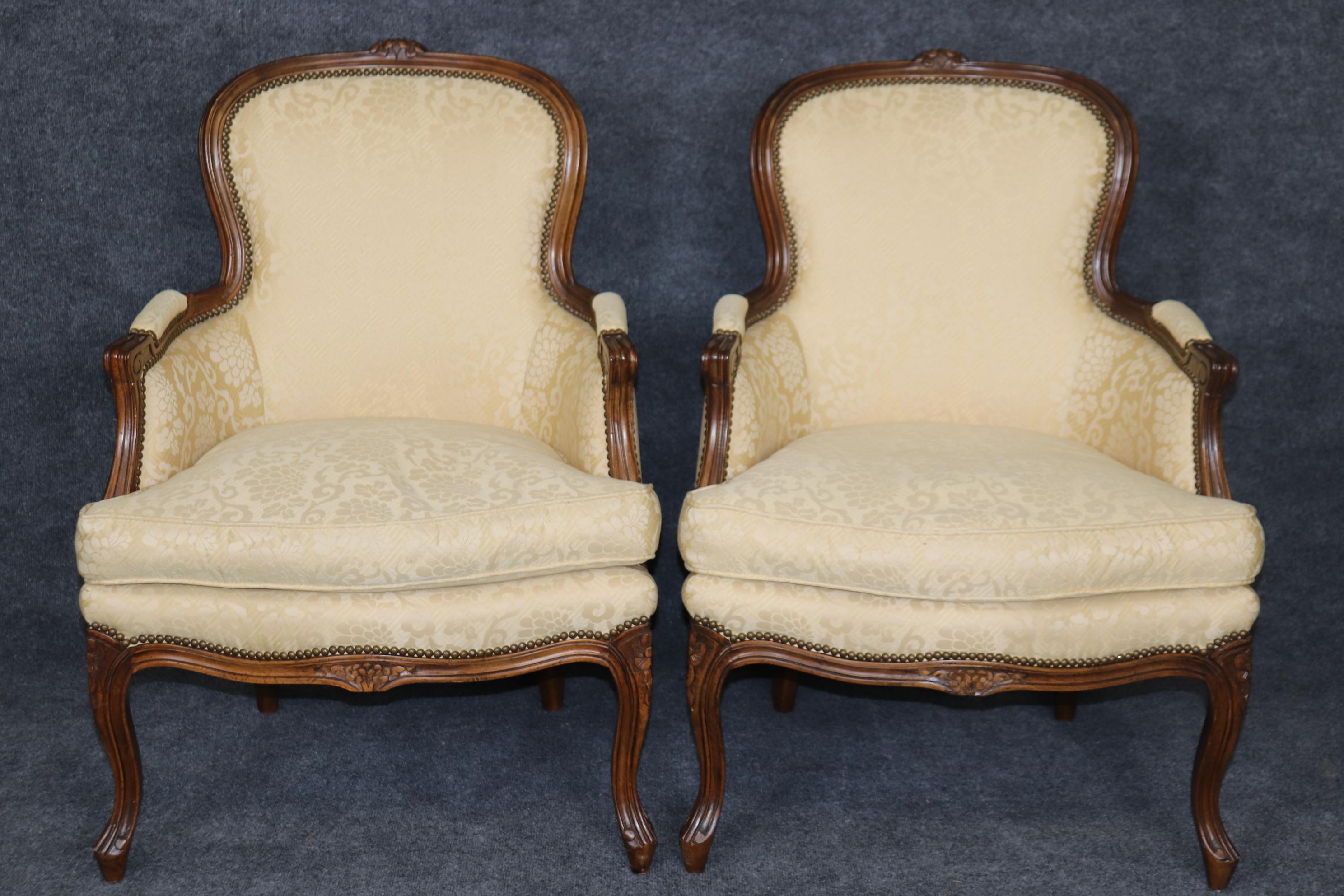 Dimensions: Height: 36 3/4in Width: 27in Depth: 27 1/2in Seat Height: 19 1/4in 

This pair of Louis XV style bergeres, armchairs, club chairs by W & T Sloane is made of the highest quality and is perfect for you and your home! If you look at the