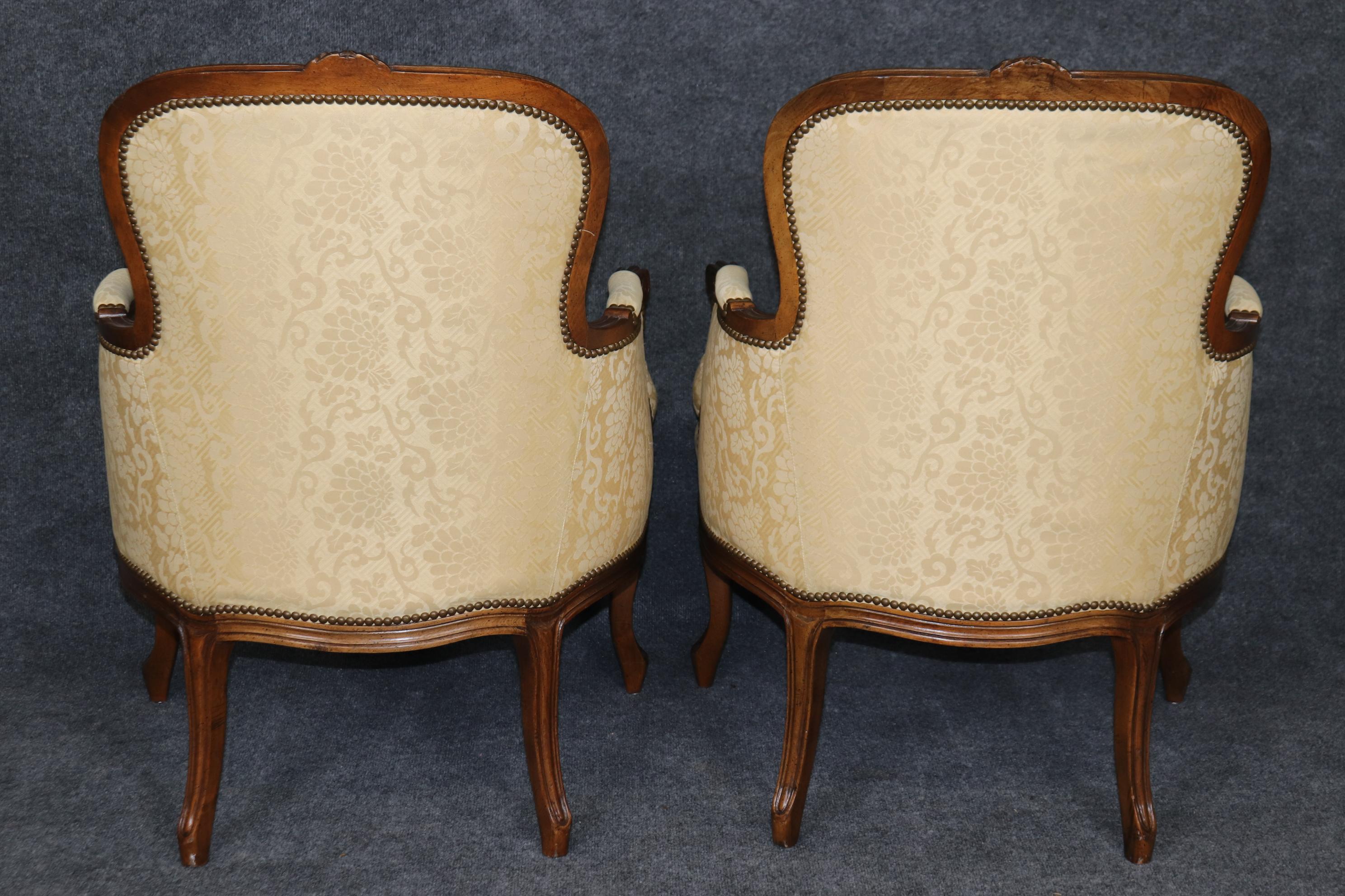 Pair of Louis XV Style Carved Bergeres with Baker Upholstery and Nailhead Trim In Good Condition For Sale In Swedesboro, NJ