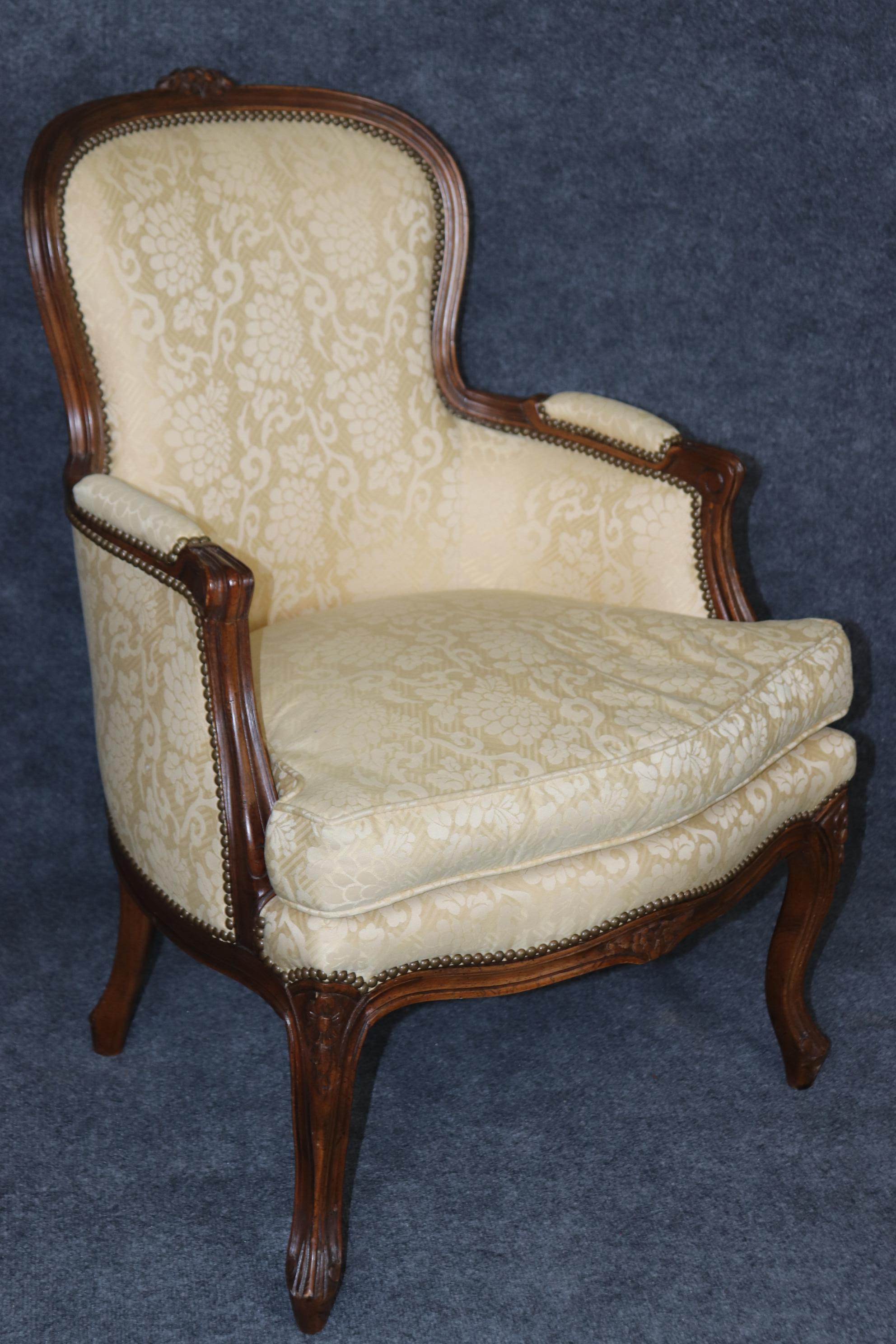 Pair of Louis XV Style Carved Bergeres with Baker Upholstery and Nailhead Trim For Sale 1