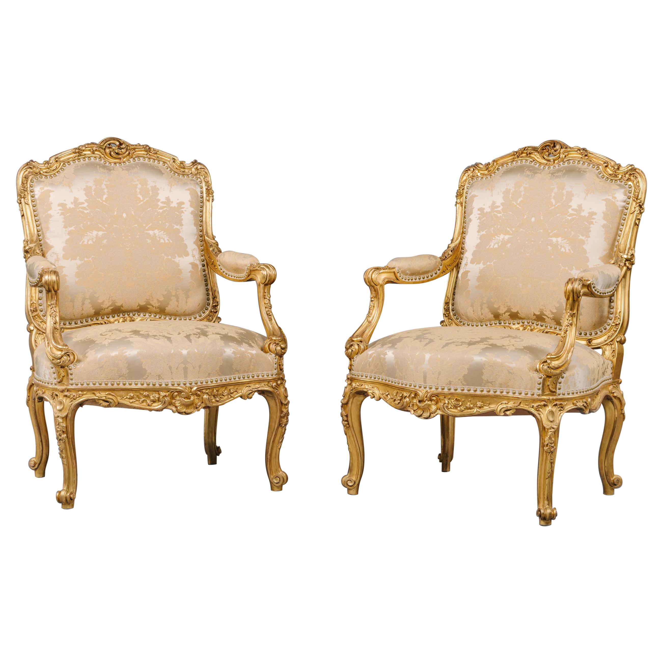 Pair of Louis XV Style Carved Giltwood Armchairs, by François Linke