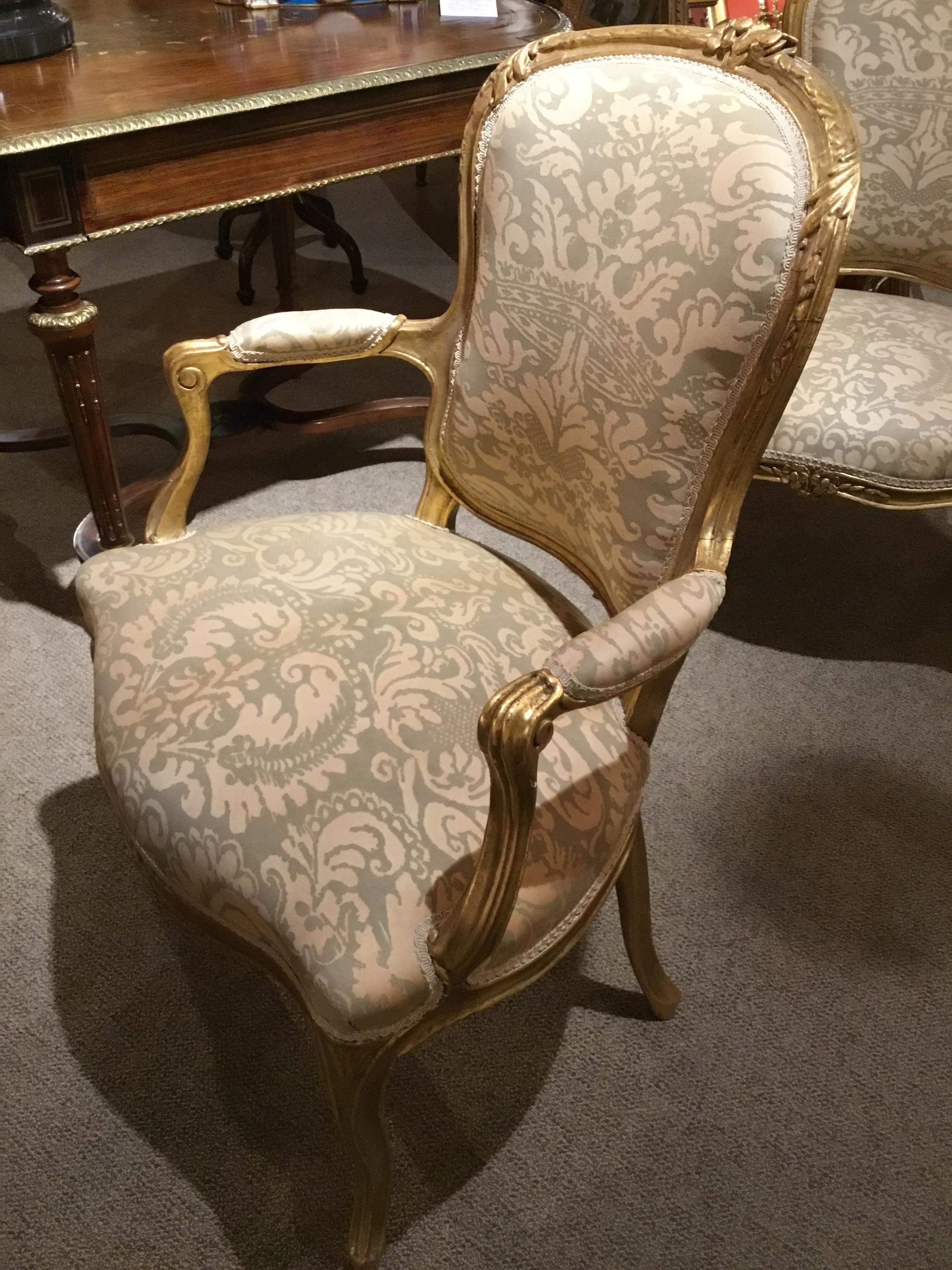 20th Century Pair of Louis XV Style Carved Giltwood Upholstered Chairs in Fortuny Fabric