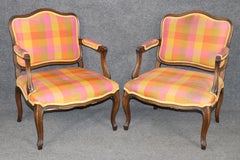 Pair of Louis XV Style Carved Walnut Arm Chairs