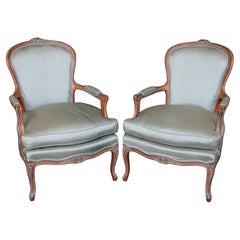 Pair of Louis XV Style Carved Walnut Blue Upholstered Armchairs