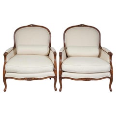 Pair of Louis XV Style Cherry Wood with Cream Upholstery Bergere Chairs