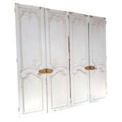 Par de puertas dobles de estilo Luis XV con decoración de estuco a doble cara, Francia