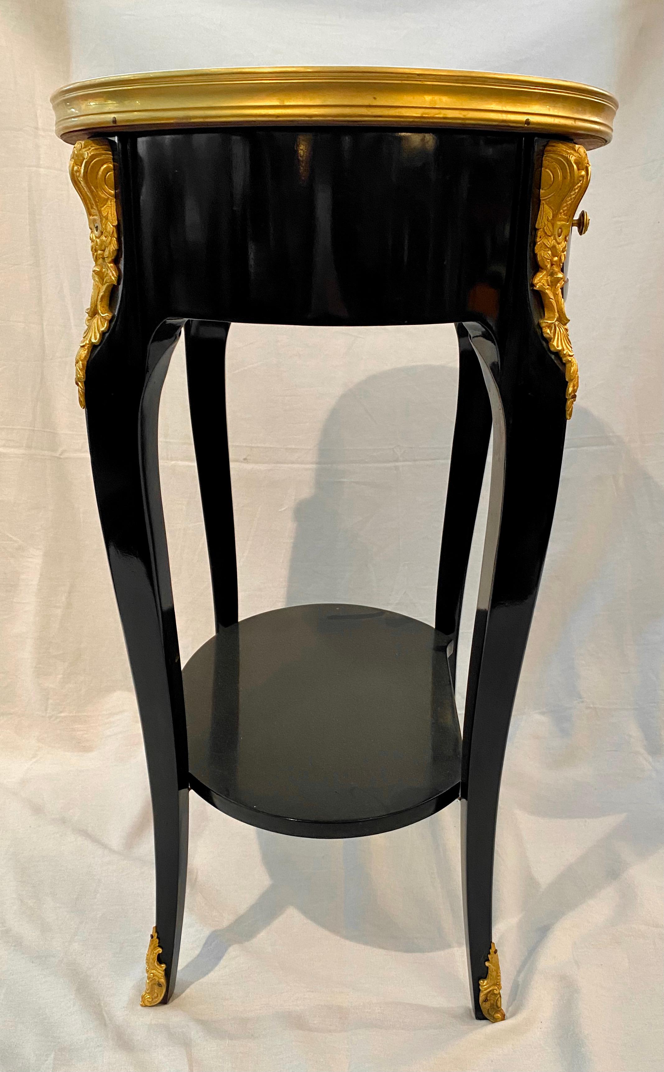 Gilt Pair of Louis XV Style Ebonized Side Tables with Marble Tops and Ormulu Mounts For Sale