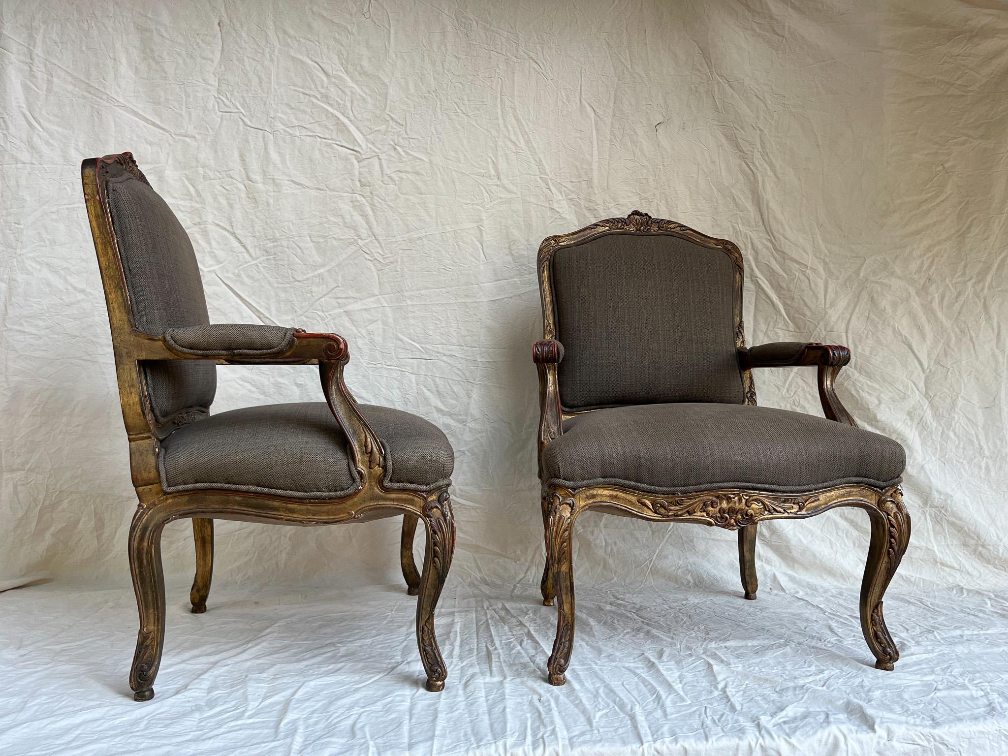 Oak Pair of Louis XV Style Fauteuils in Gilded and Patinated Wood For Sale