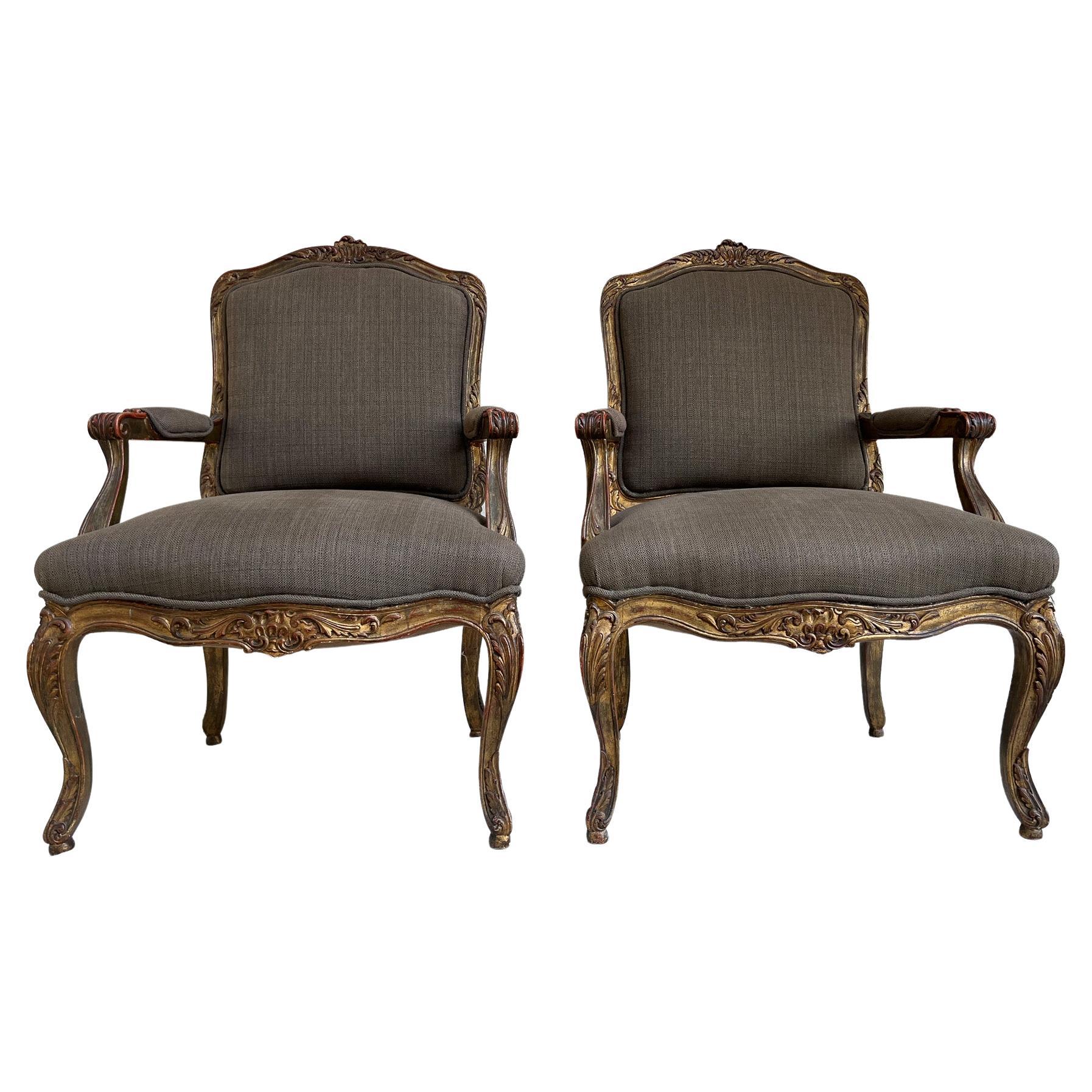 Pair of Louis XV Style Fauteuils in Gilded and Patinated Wood