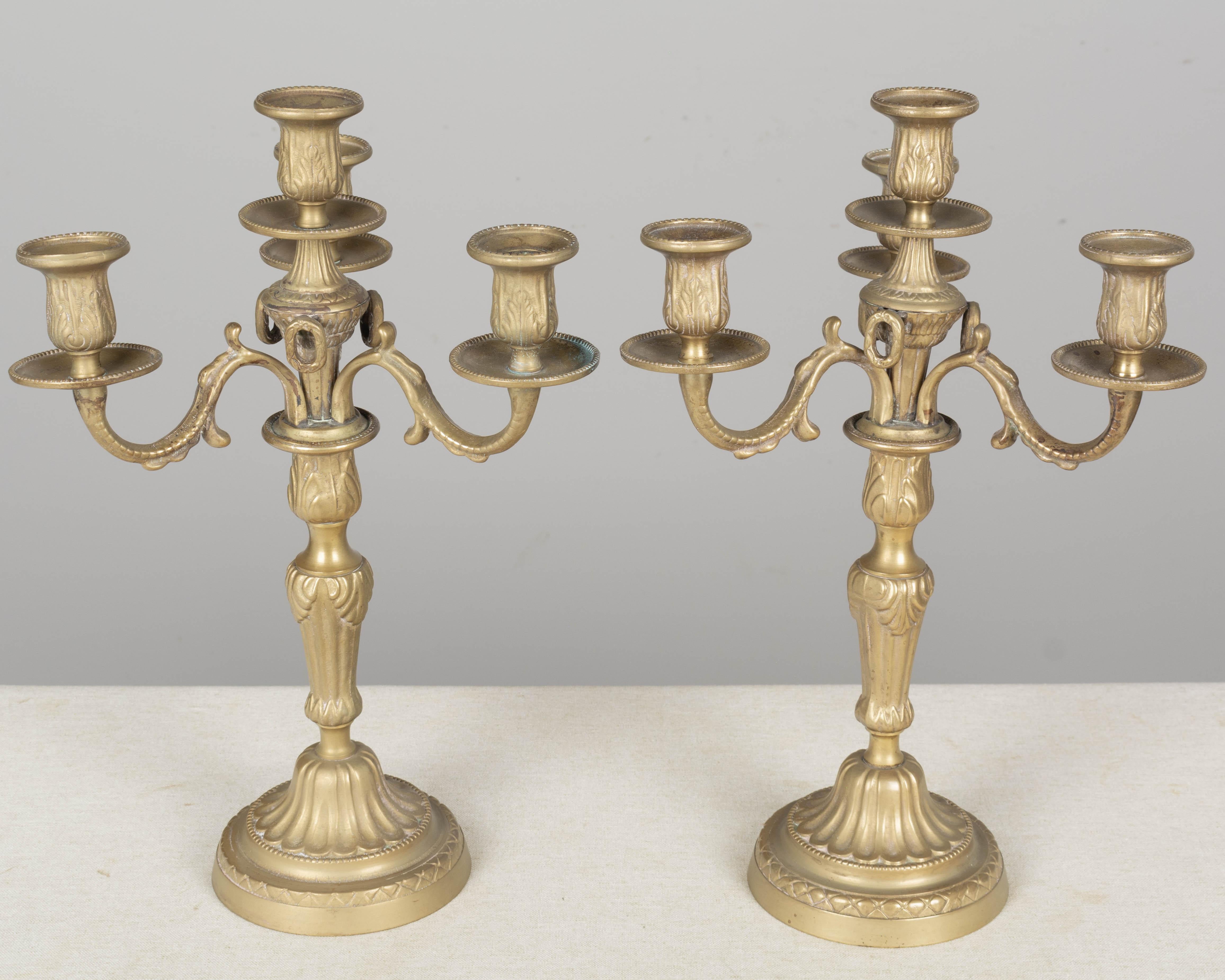 Cast Pair of Louis XV Style French Brass Candelabra For Sale