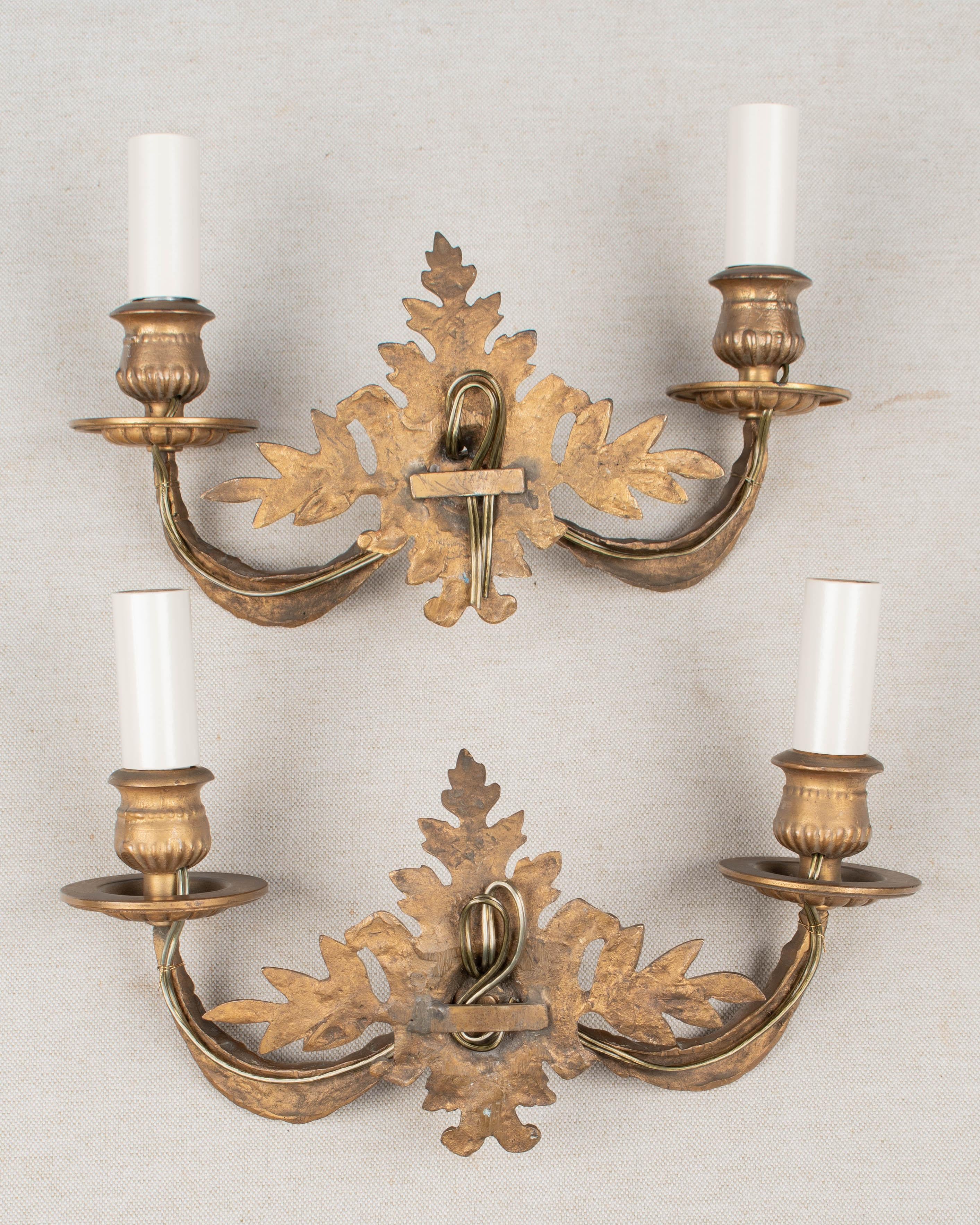 Cast Pair of Louis XV Style French Bronze Sconces For Sale