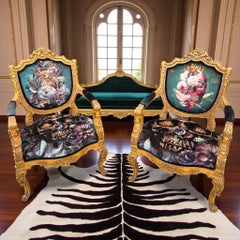 Pair of Louis XV style Gilt Armchairs with Baroque gothic Iconography Upholstery