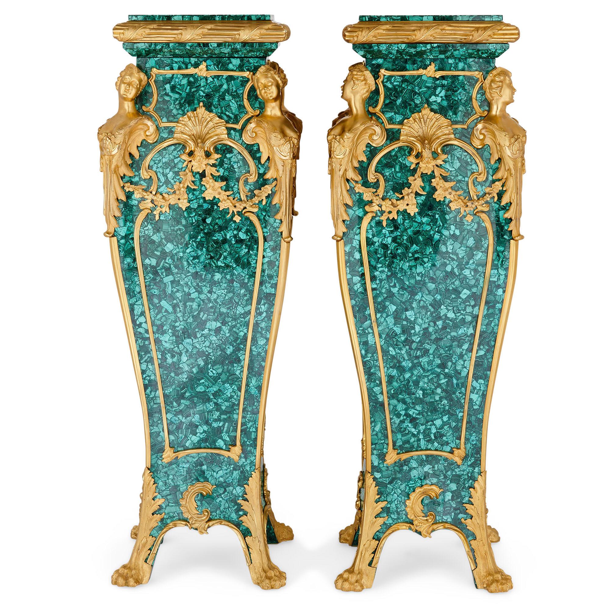 Pair of Louis XV style gilt bronze and malachite stands
French, 20th century
Measures: Height 117cm, width 40cm, depth 40cm

This pair of malachite and ormolu pedestals are crafted in the bombe shape, in the manner of important French maker