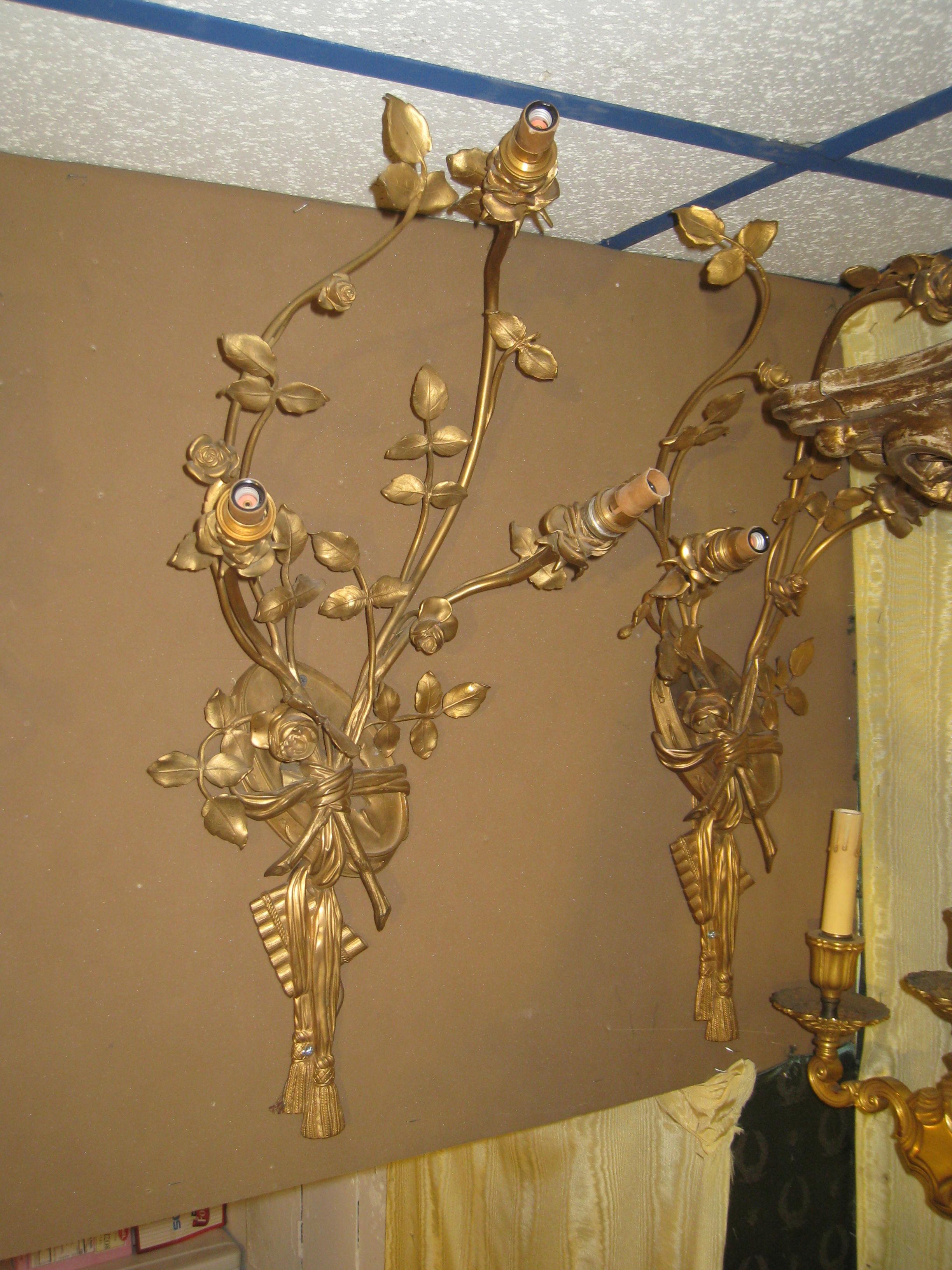 French Pair of Louis XV Style Gilt Bronze Musical Motif Wall Light Sconces For Sale