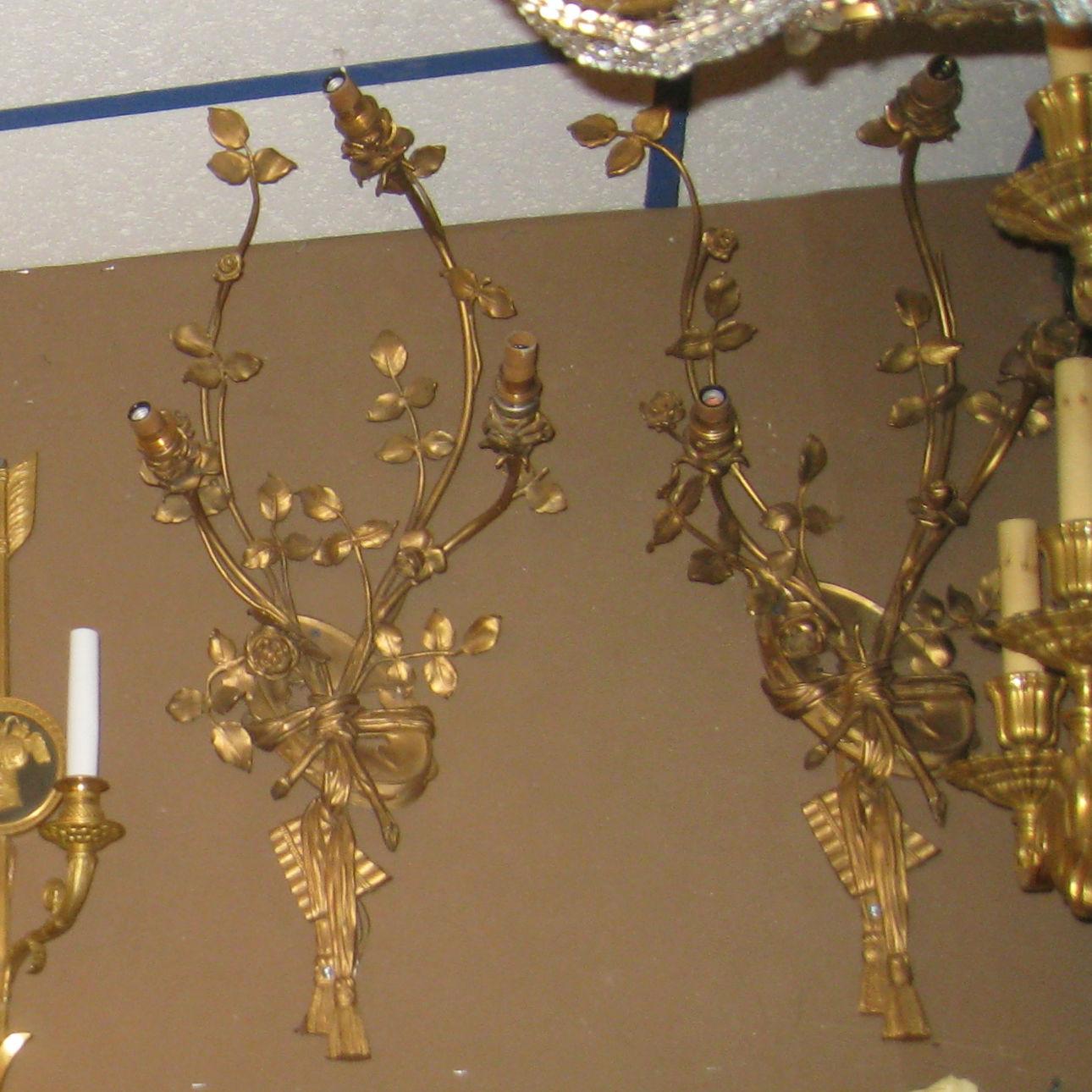 20th Century Pair of Louis XV Style Gilt Bronze Musical Motif Wall Light Sconces For Sale