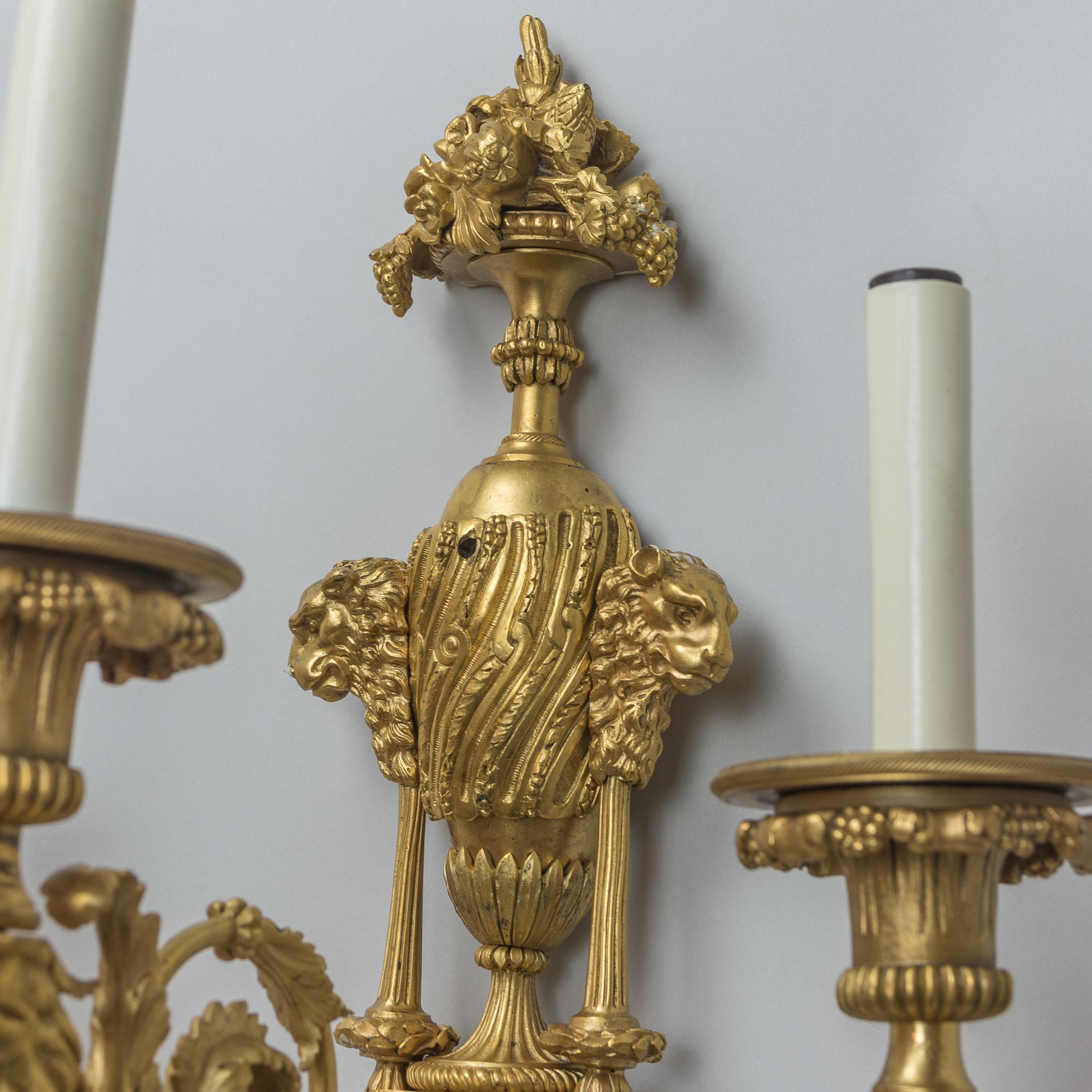 Pair of Louis XV Style Gilt Bronze Three-Light Wall Sconces In Excellent Condition For Sale In New York, NY