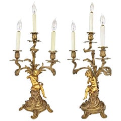 Pair of Louis XV Style Gilt-Metal Three-Light Candelabras with Cherub Motif