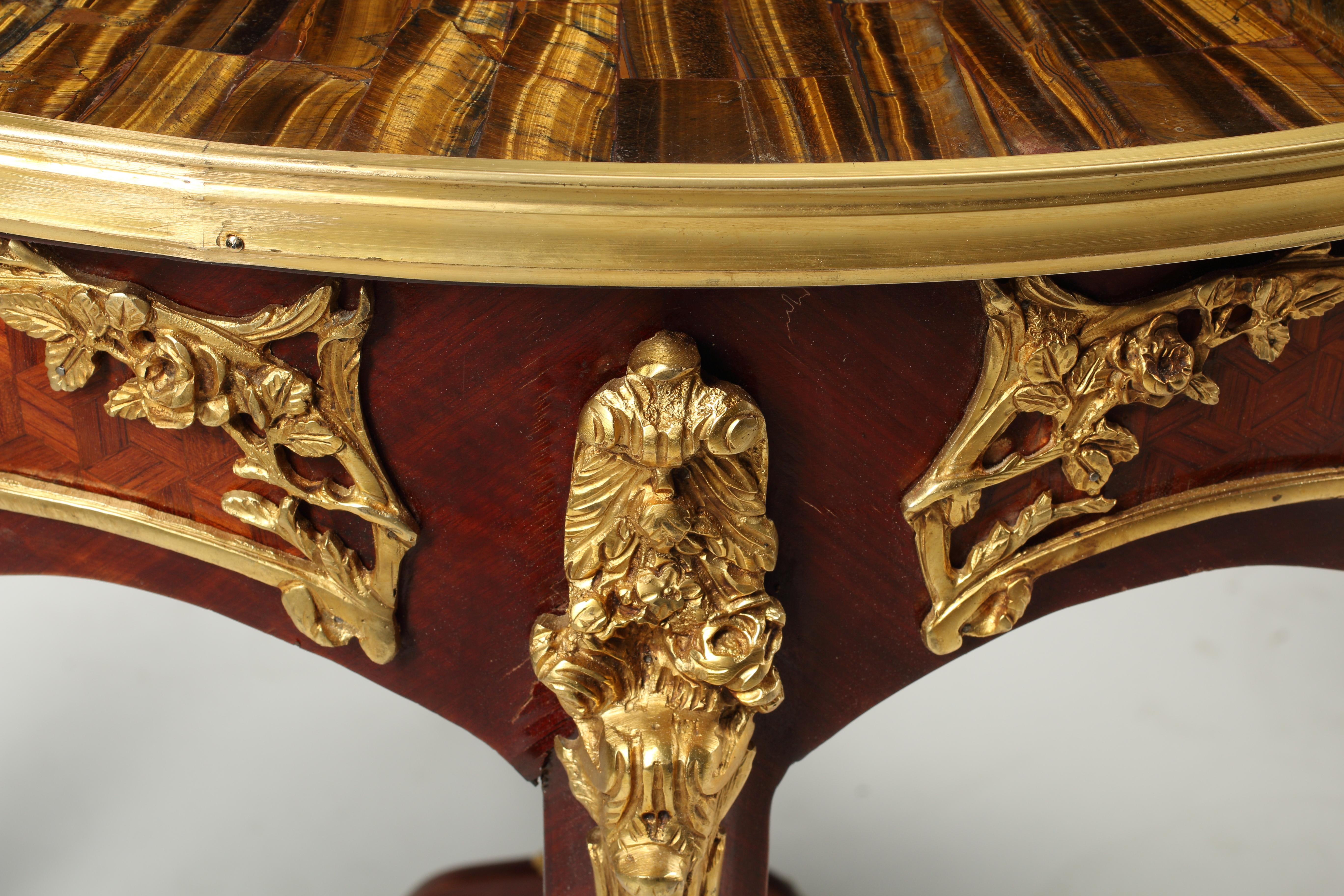 20ième siècle Pair of Louis XV Style Gueridons with Tiger's Eye Table Tops en vente