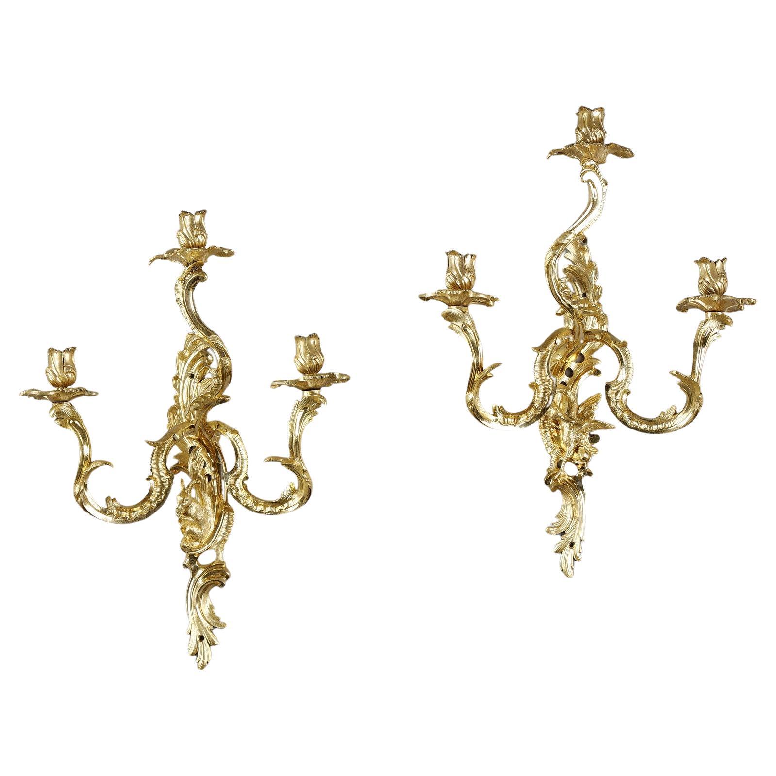 Pair of Louis XV style ormolu sconces  For Sale