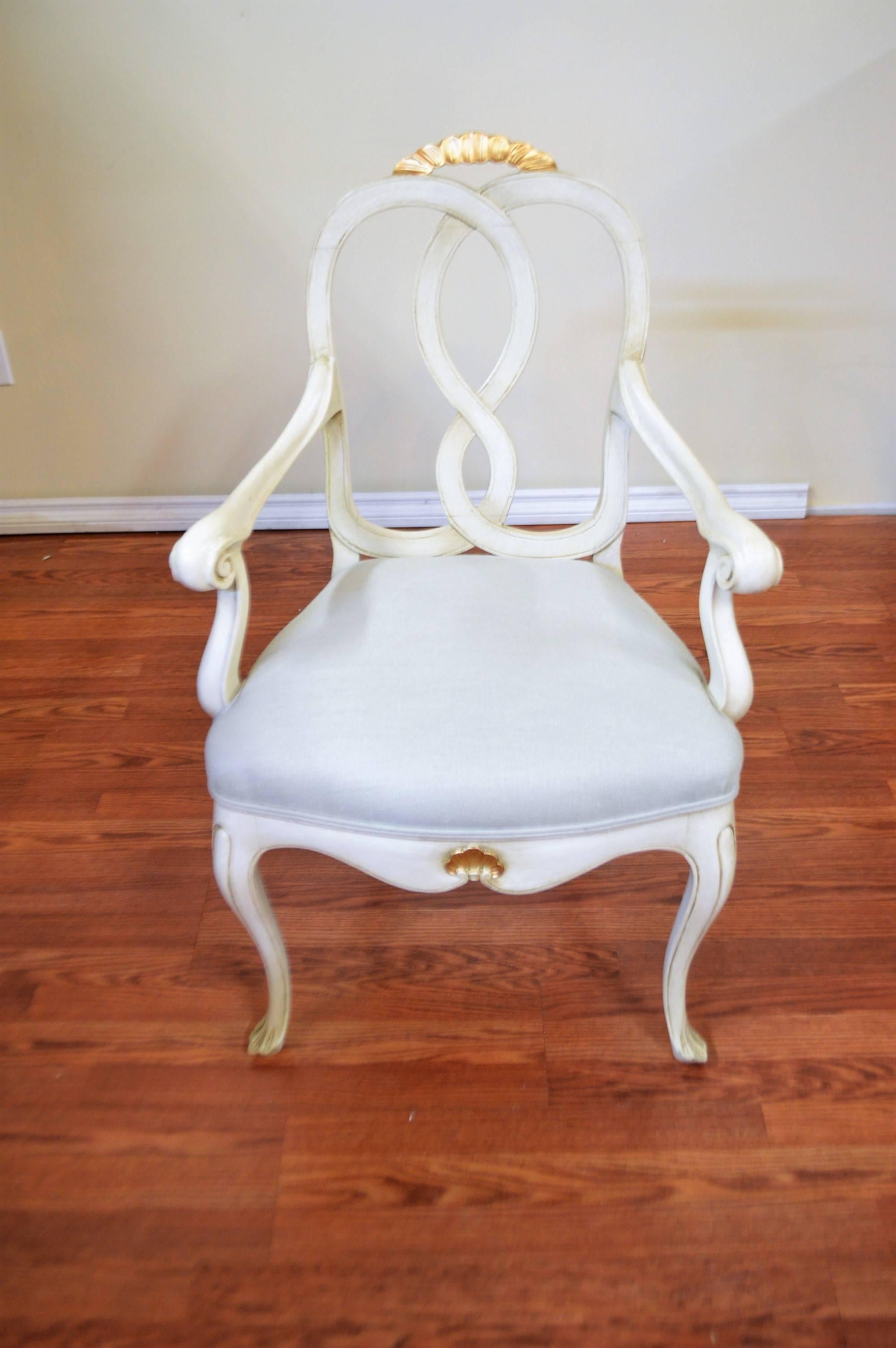 Unusual design on this pair of relaxed yet chic Louis XV style armchairs. They have been newly upholstered with a light turquoise Belgium linen.