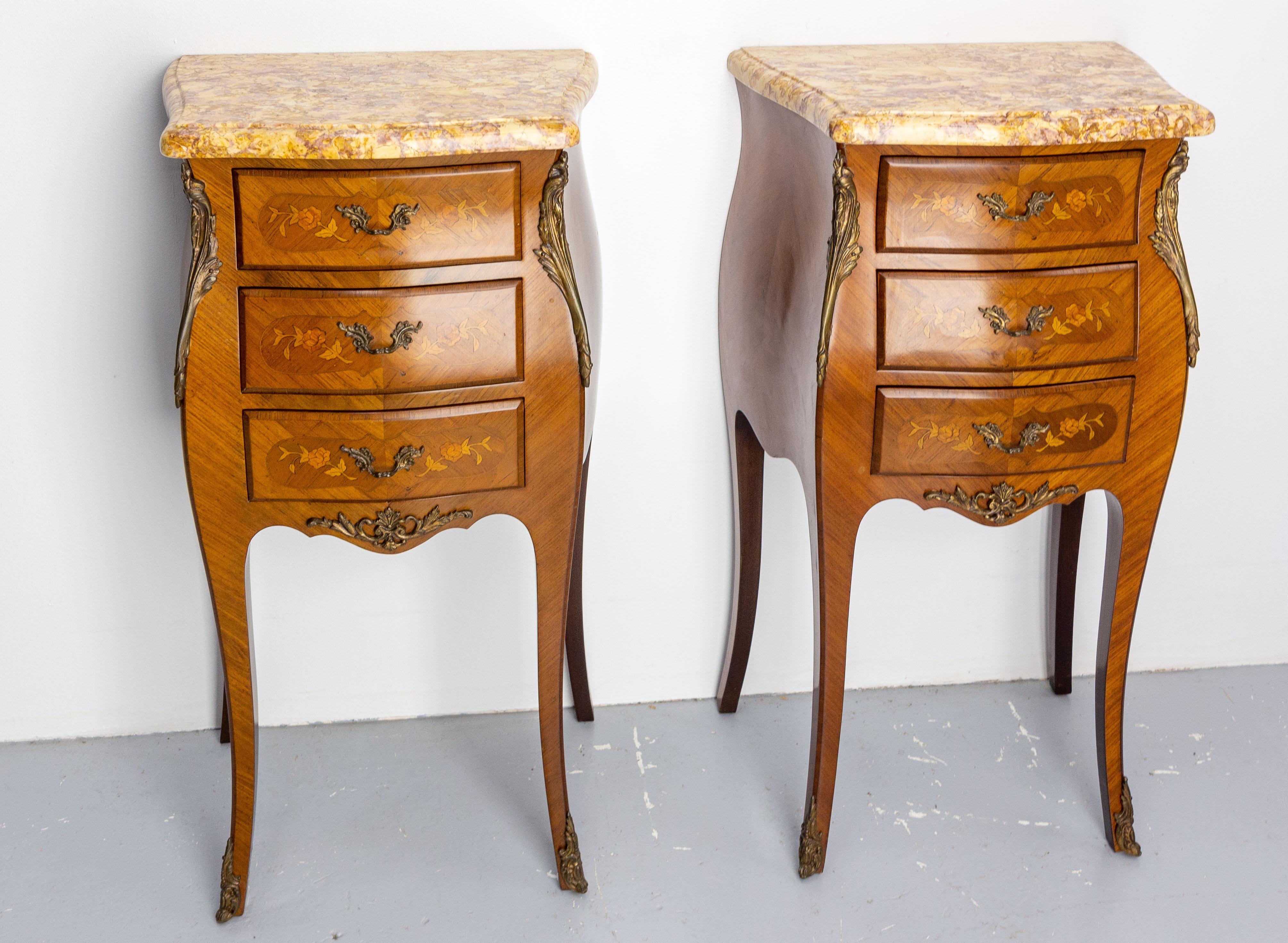 Pair of French side cabinets Louis XV style nightstands
Bedside tables
Yellow and purple marble tops
Three drawers with inlaid rose decorations
Good antique condition.

Shipping: 
1 pack: 55 /40 / 74 cm 27.2 kg.