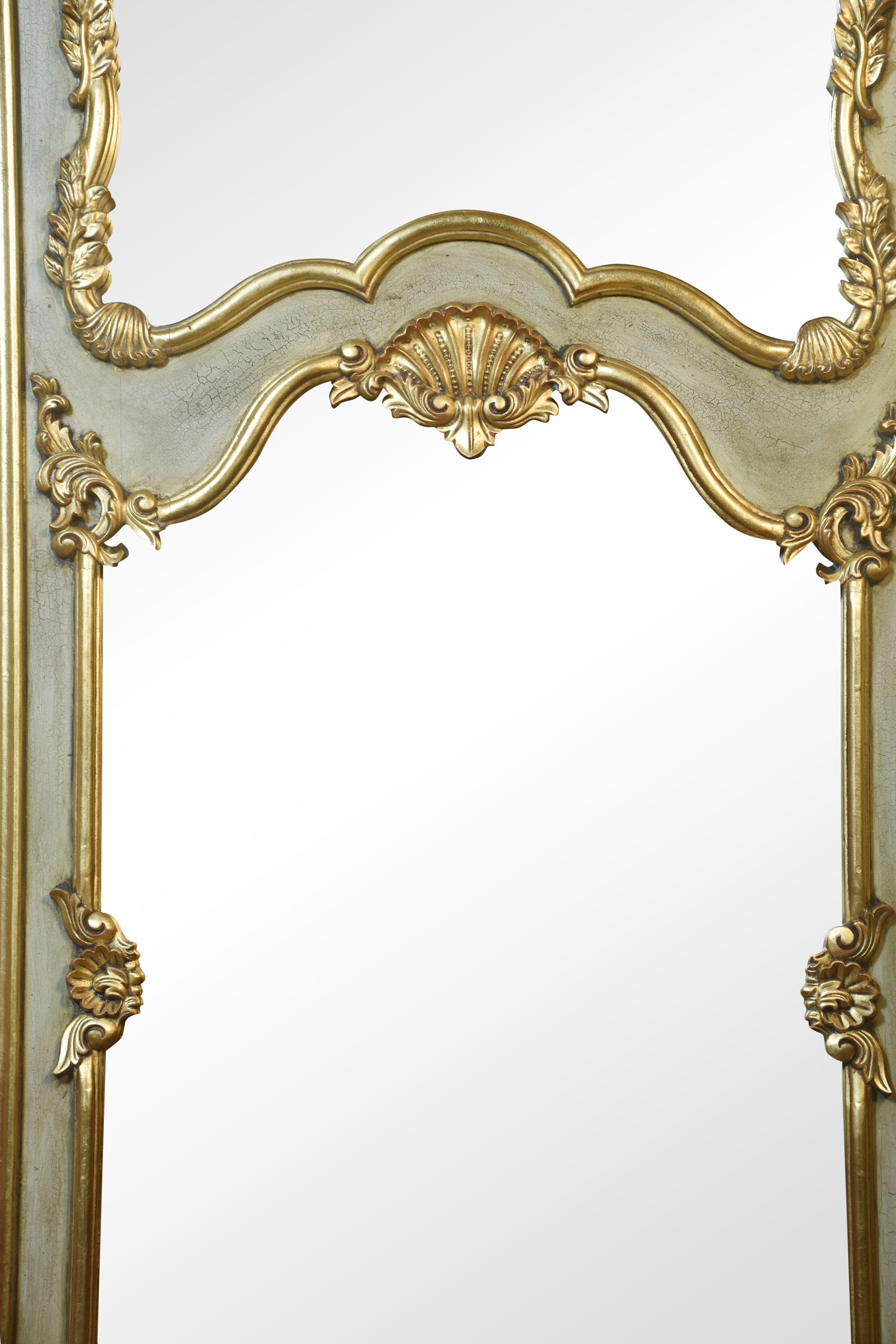 Pair of Louis XV style mirrors, of rectangular form, the moulded top above foliated decoration to the two original plate mirrors incased in giltwood highlighted borders with French green frames.
Dimensions
Height 74.5 Inches
Width 55.5