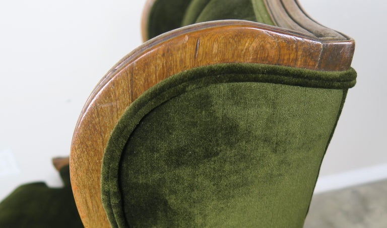 Pair of Louis XV Style Walnut and Green Velvet Wingback Bergères For Sale at 1stdibs