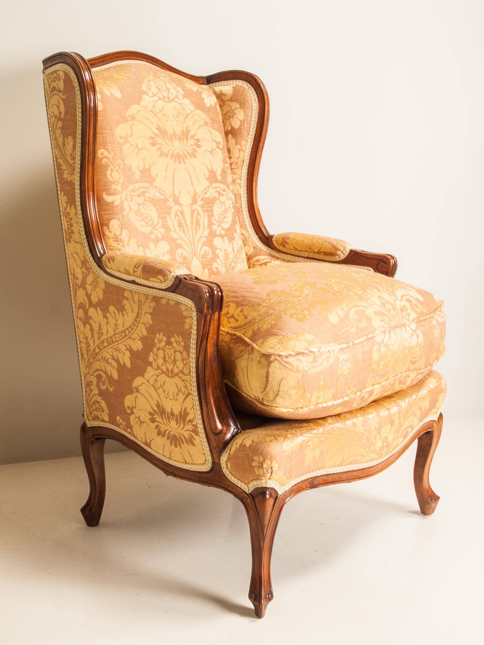 Elegant shape and very comfortable sitting - this is their characteristic. They are made of solid walnut, their cabriole legs are on the end nicely scrolled. Upholstered in Venetian silk brocade. Goose feathers cushioned seats enable great comfort.