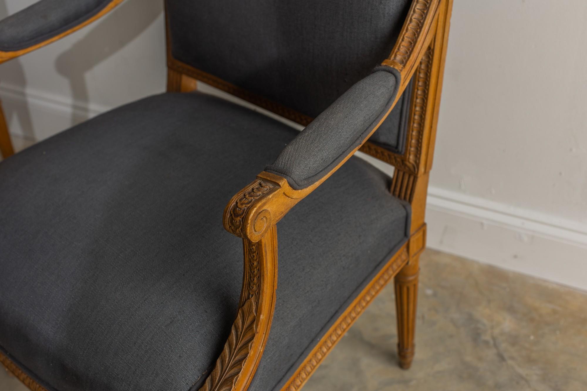 This beautiful pair of cabriolet armchairs is in pristine condition with no flaws. They are also very sturdy. There is no wear on the fabric or the wood. The colors of the fabric and wood are very beautiful.