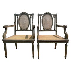 Pair of Louis XVI armchairs with rechamped wood and caning